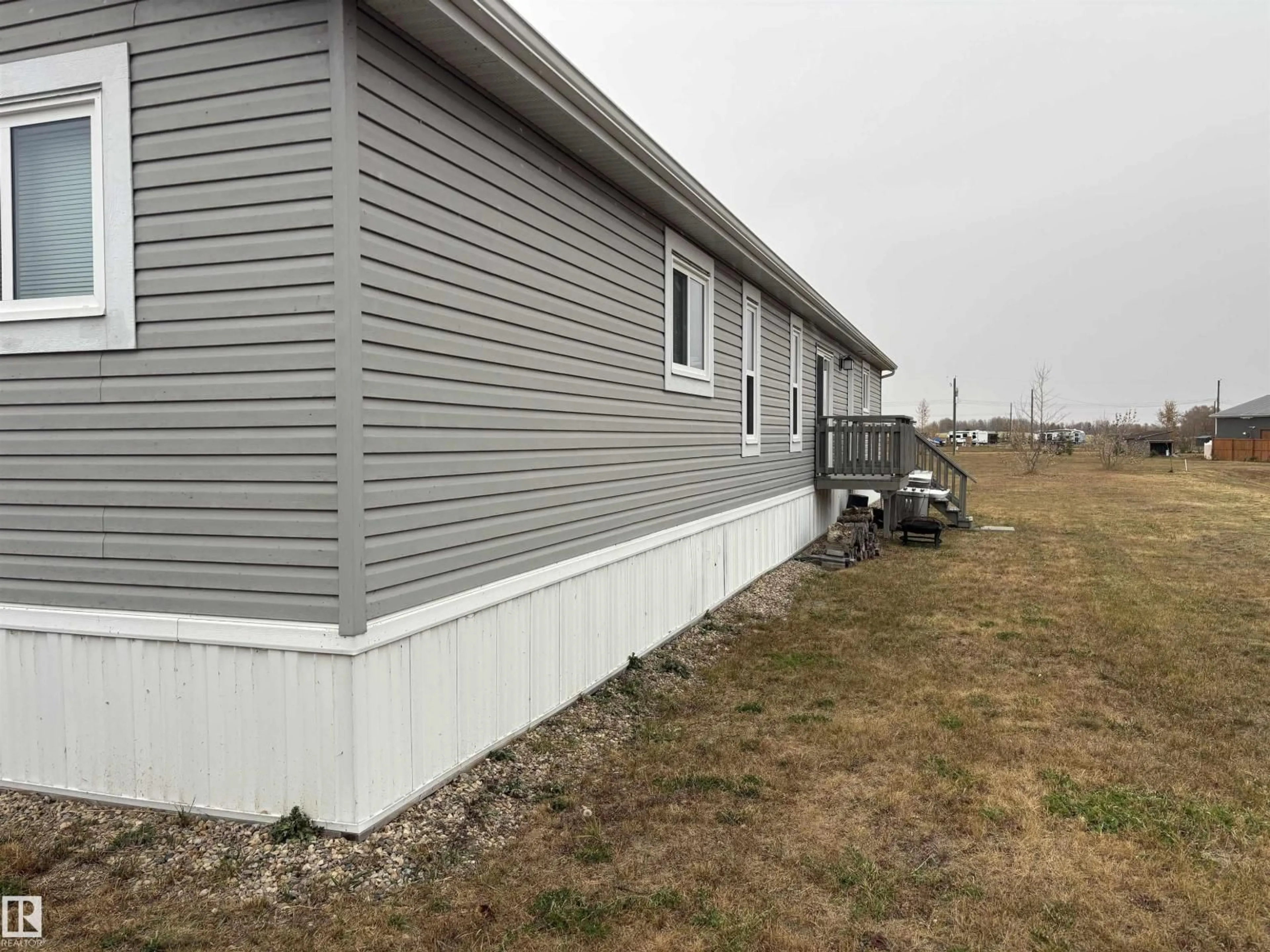 Home with vinyl exterior material, building for 1602 PARAKEET CL, Rural Camrose County Alberta T0B4J1