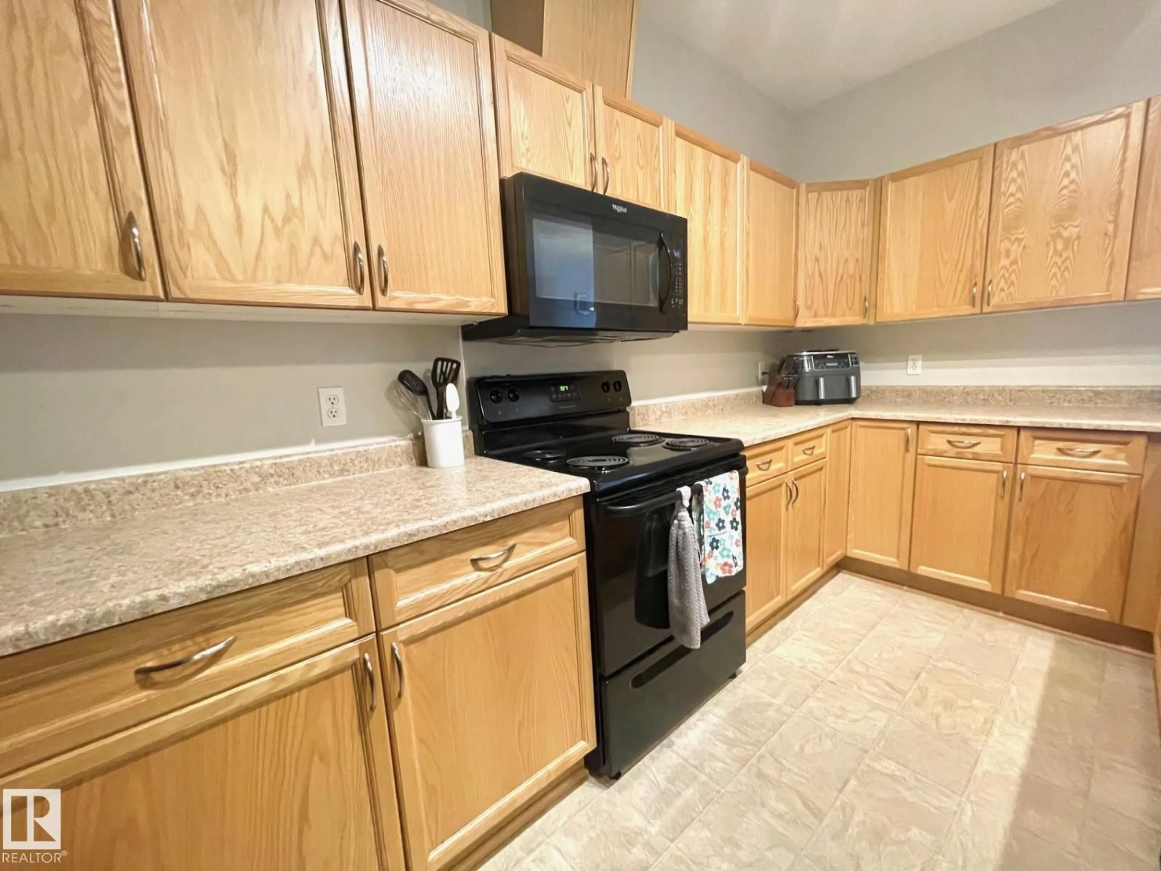 Standard kitchen, ceramic/tile floor for #407 - 4304 139 AV, Edmonton Alberta T5Y0H6