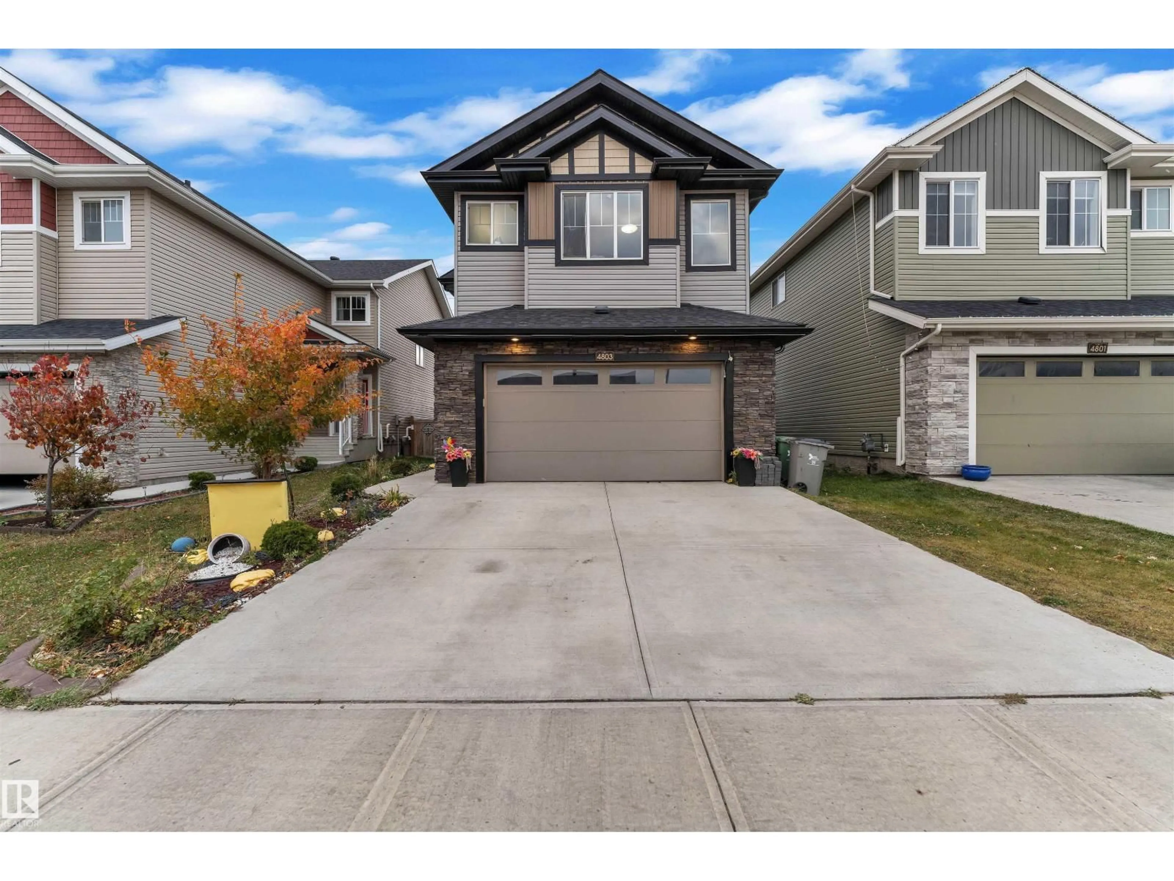 Home with vinyl exterior material, street for 4803 35 ST, Beaumont Alberta T4X2C4