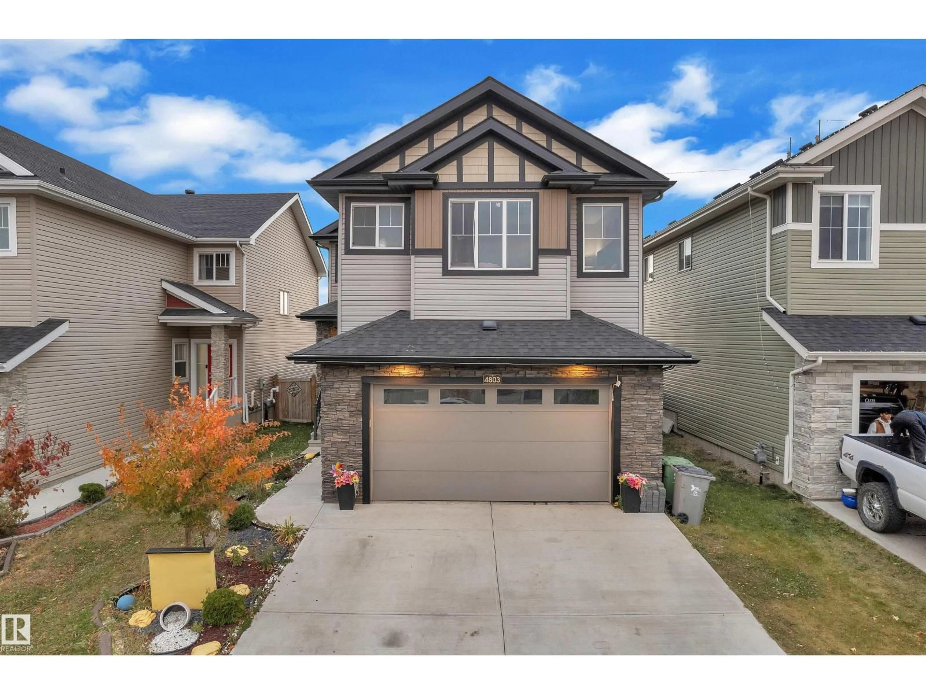 Home with vinyl exterior material, street for 4803 35 ST, Beaumont Alberta T4X2C4