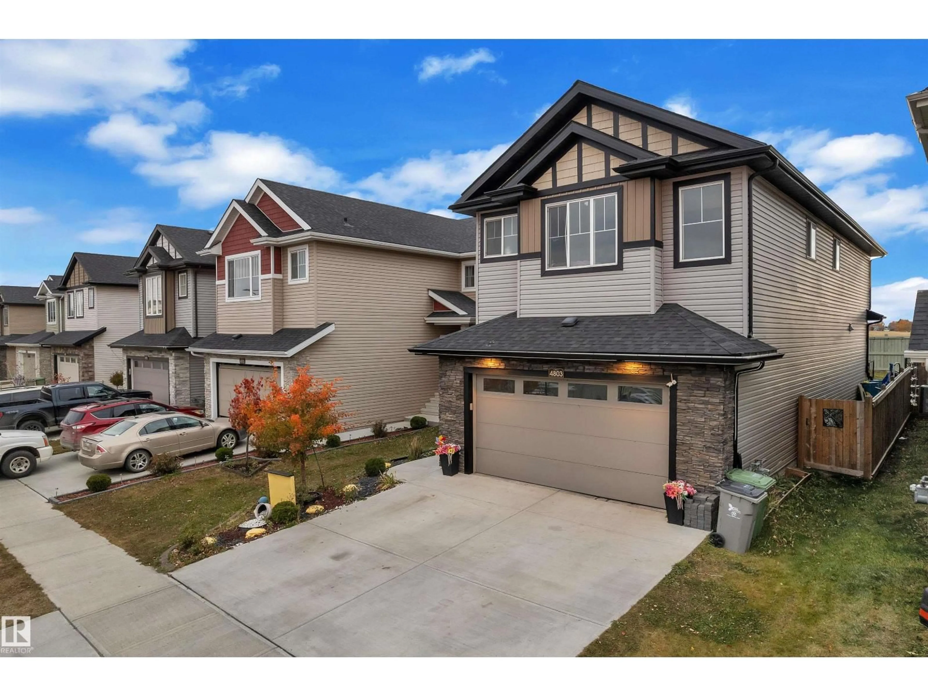 Home with vinyl exterior material, street for 4803 35 ST, Beaumont Alberta T4X2C4