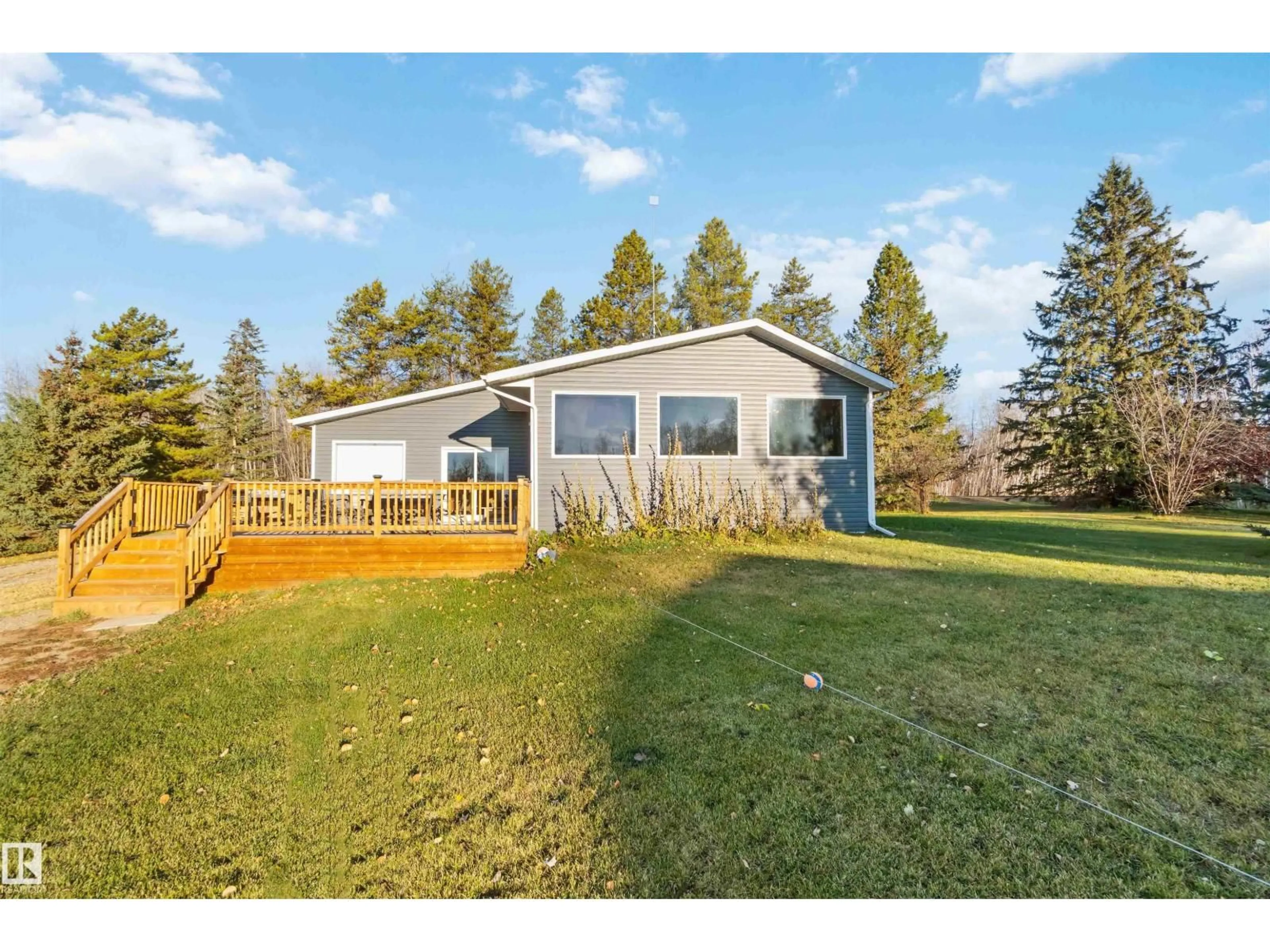 A pic from outside/outdoor area/front of a property/back of a property/a pic from drone, water/lake/river/ocean view for 6209 HWY 633, Rural Lac Ste. Anne County Alberta T0E0L0