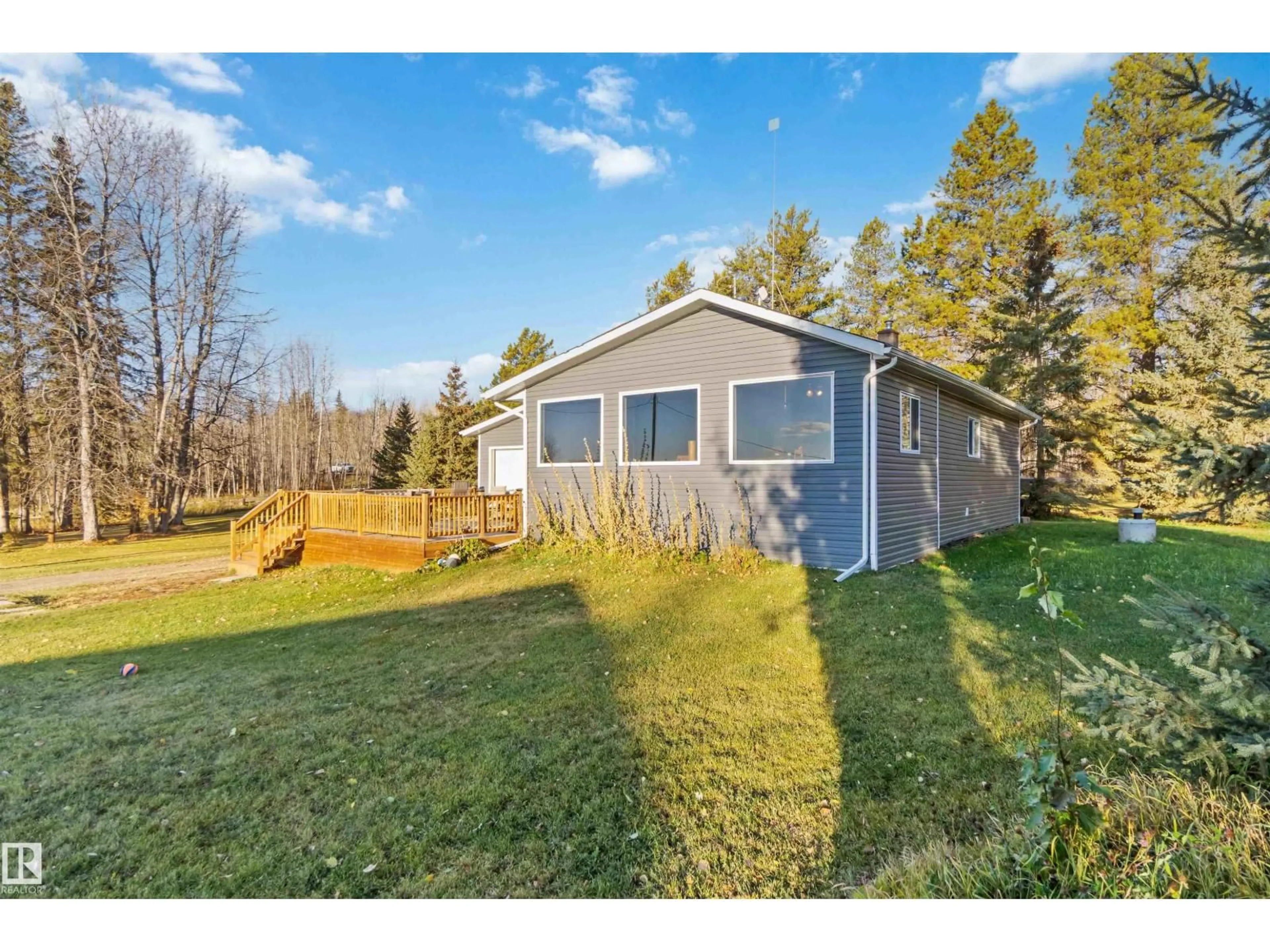 A pic from outside/outdoor area/front of a property/back of a property/a pic from drone, water/lake/river/ocean view for 6209 HWY 633, Rural Lac Ste. Anne County Alberta T0E0L0