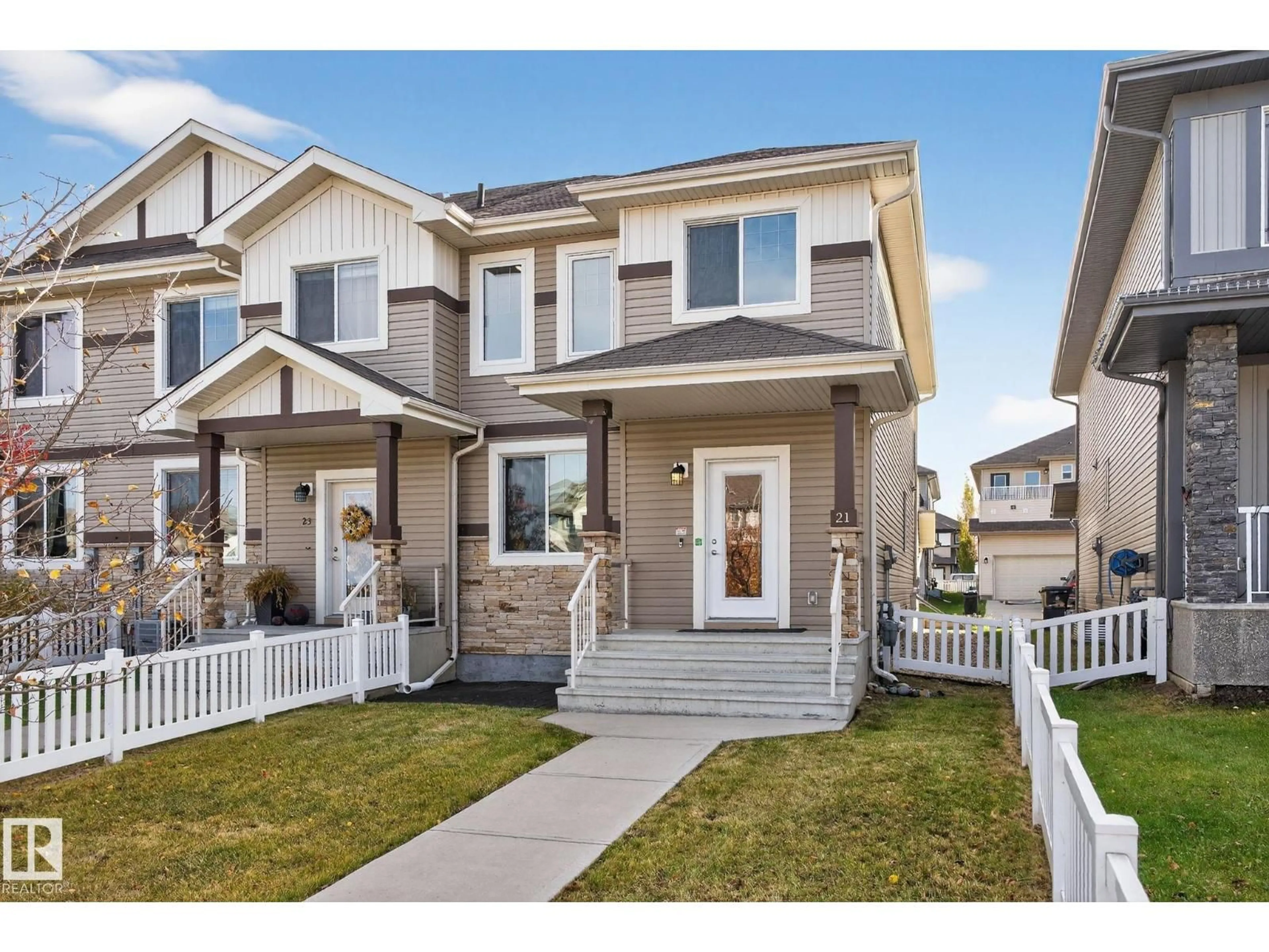 Home with vinyl exterior material, street for 21 SIERRA WD, Fort Saskatchewan Alberta T8L0T3