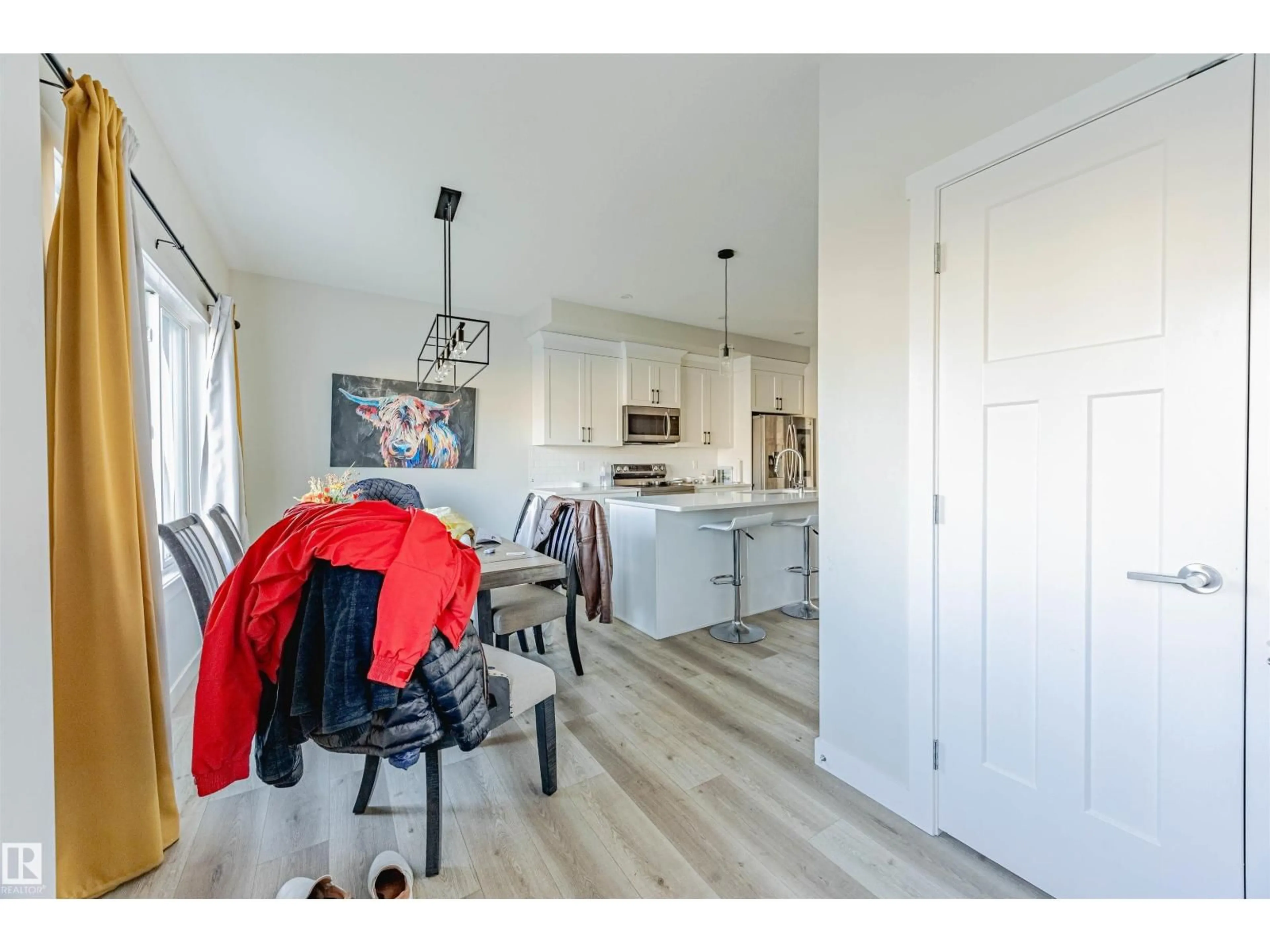 Open concept kitchen, wood/laminate floor for 8511 96 AV, Morinville Alberta T8R1T3
