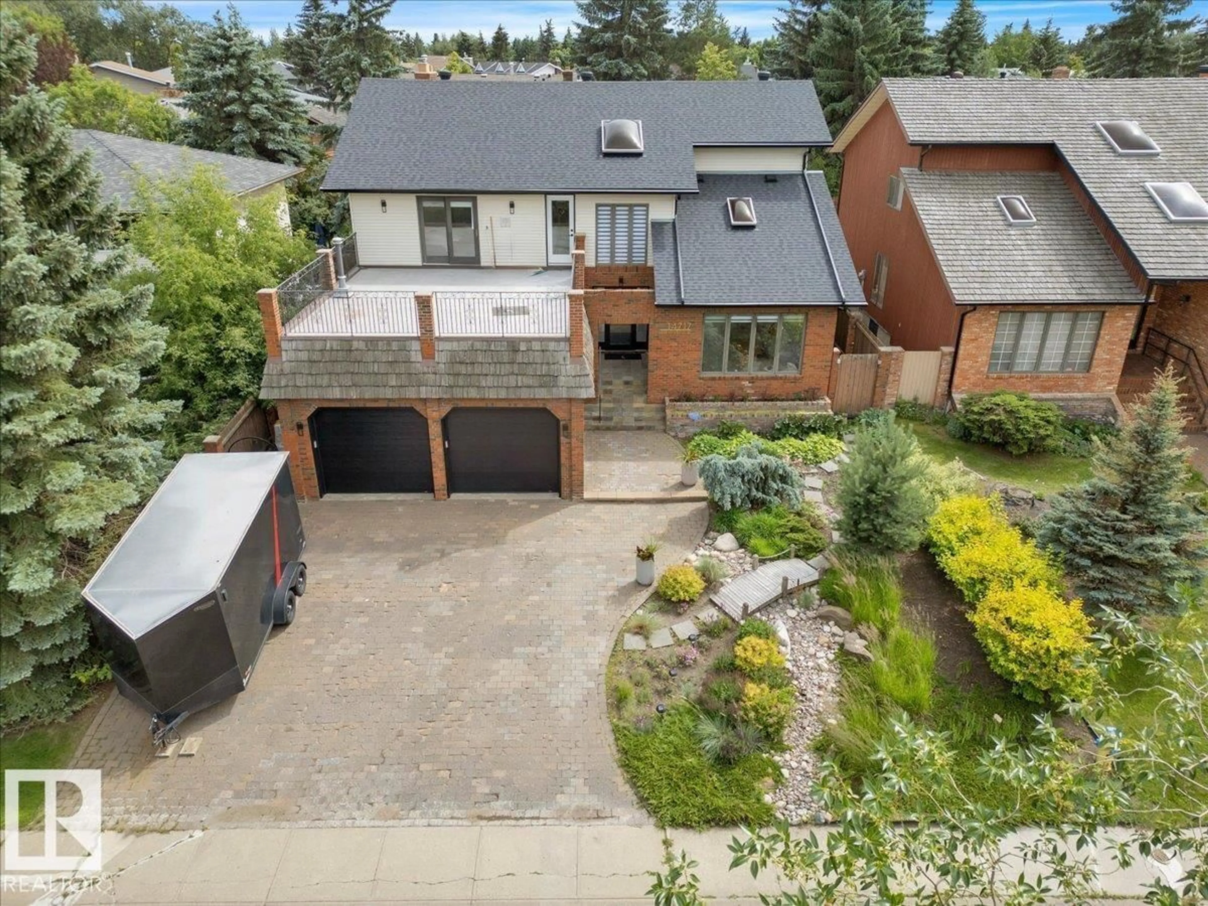 A pic from outside/outdoor area/front of a property/back of a property/a pic from drone, street for 14717 48 AV, Edmonton Alberta T6H5N1