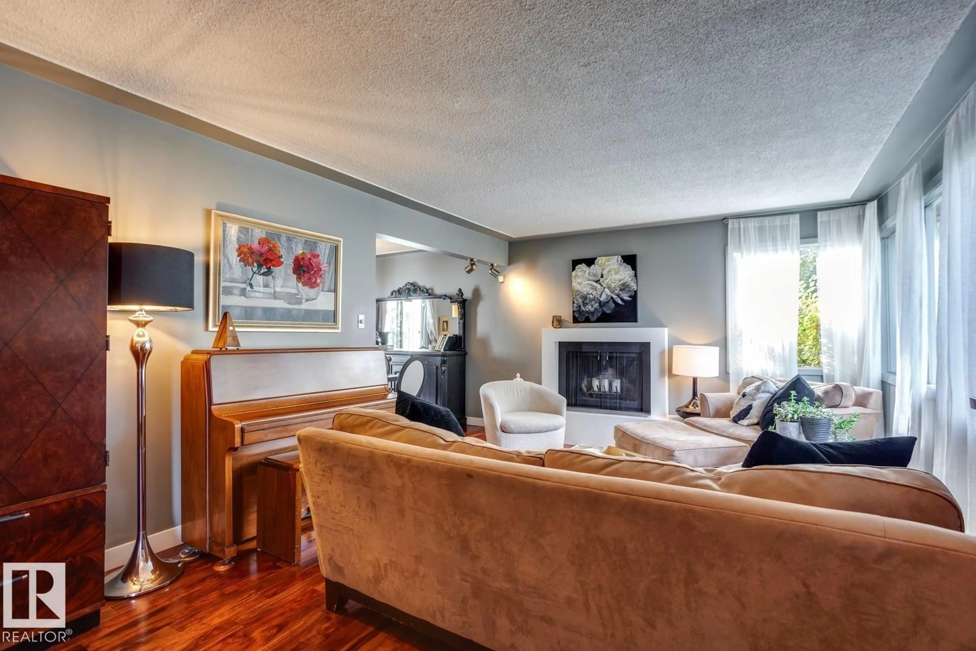 Living room with furniture, wood/laminate floor for NW - 4907 114B ST, Edmonton Alberta T6H3N2
