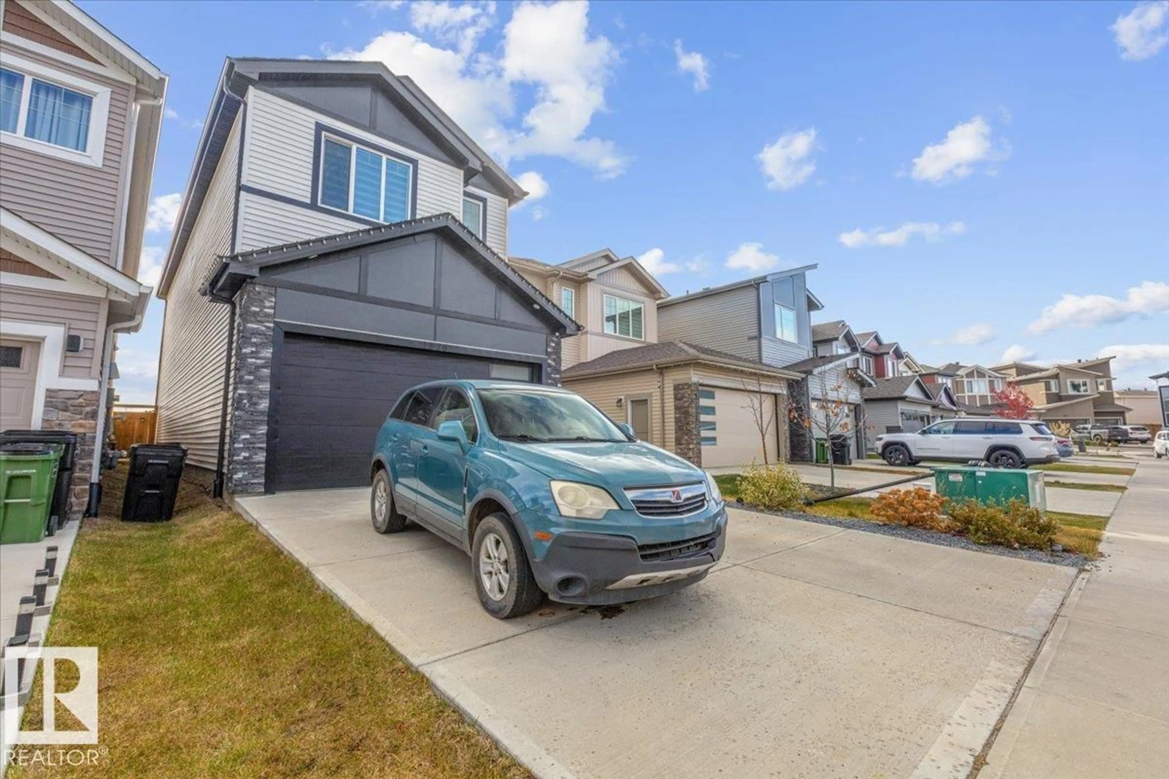 Home with vinyl exterior material, street for NW - 1325 20 ST, Edmonton Alberta T6T2R8