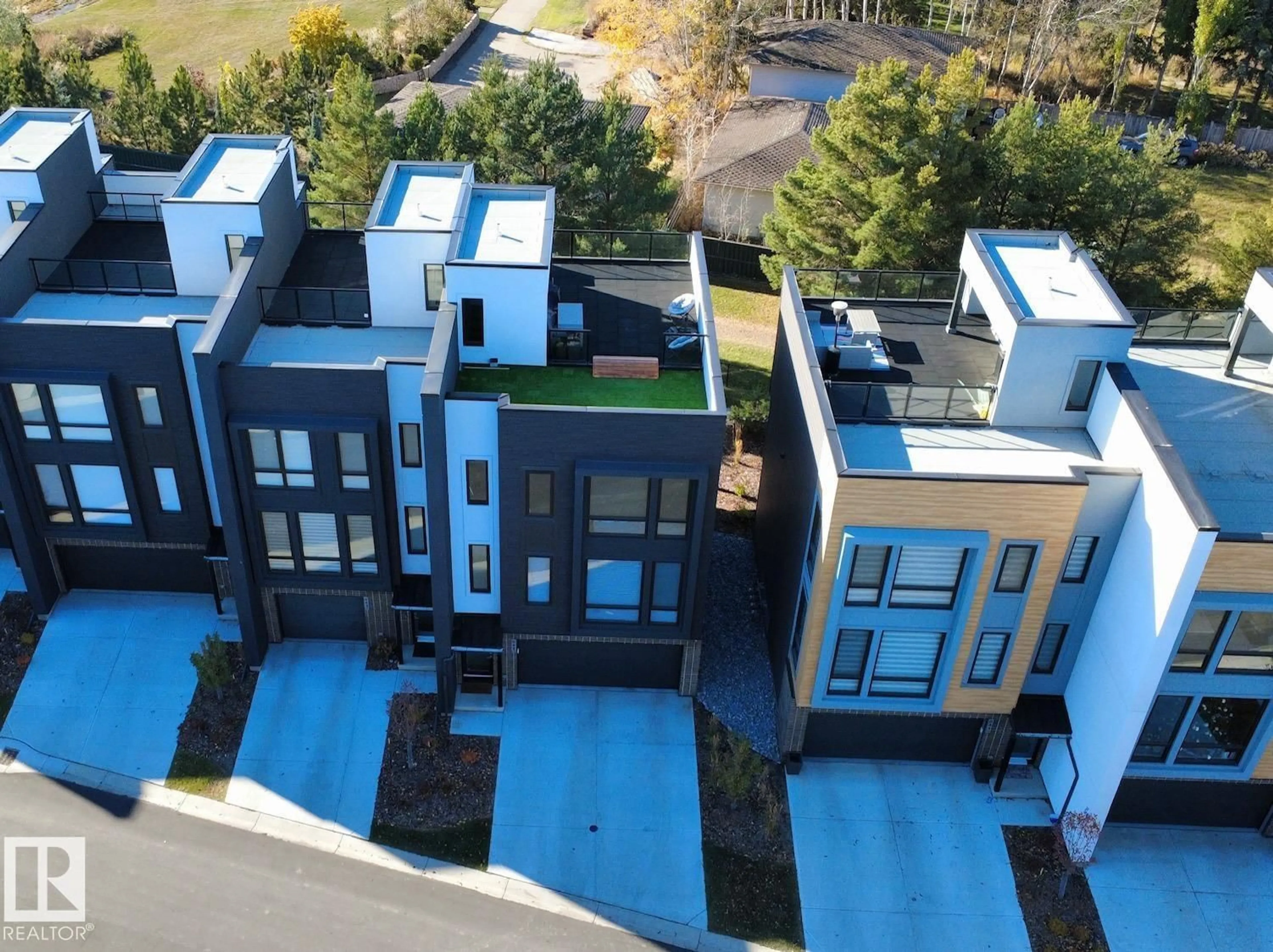 A pic from outside/outdoor area/front of a property/back of a property/a pic from drone, street for #42 - 1304 RUTHERFORD RD, Edmonton Alberta T6W0B4