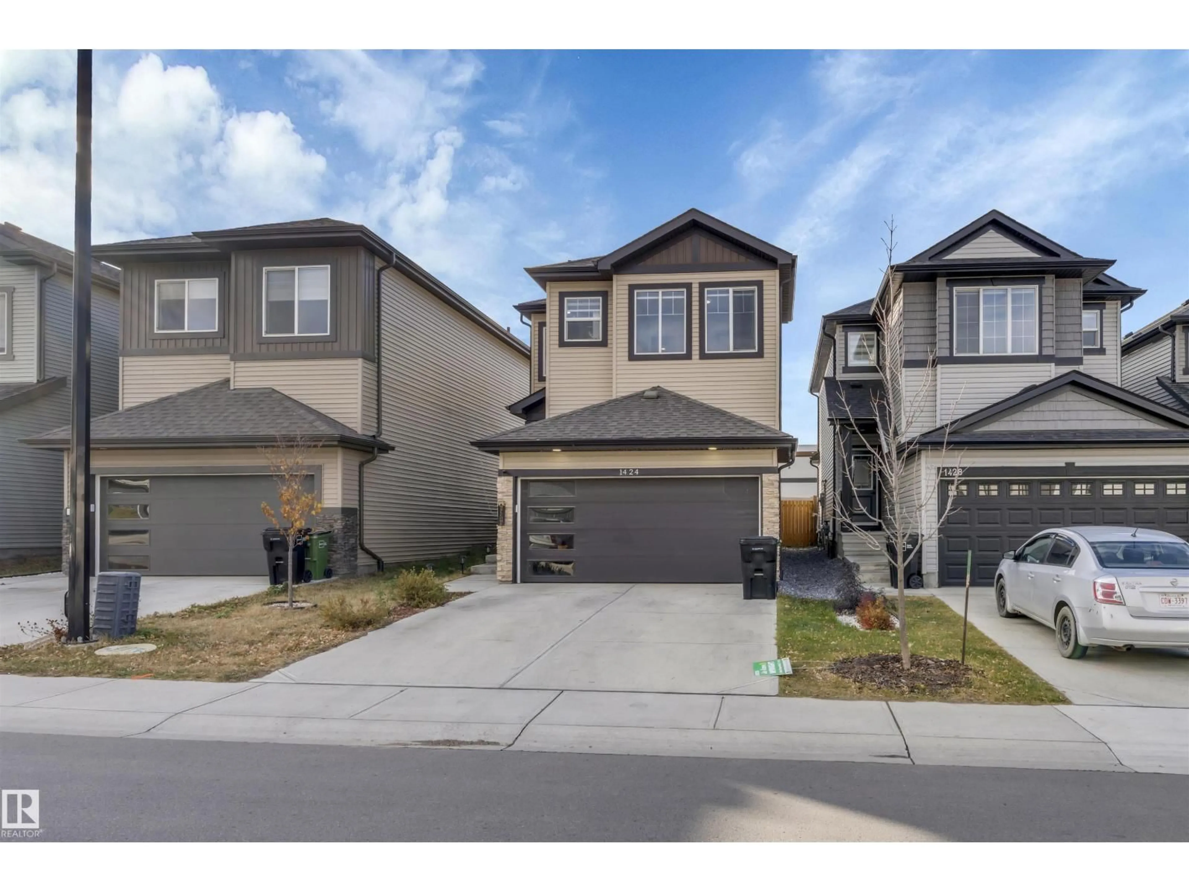 A pic from outside/outdoor area/front of a property/back of a property/a pic from drone, street for 1424 15 ST, Edmonton Alberta T6T2S2