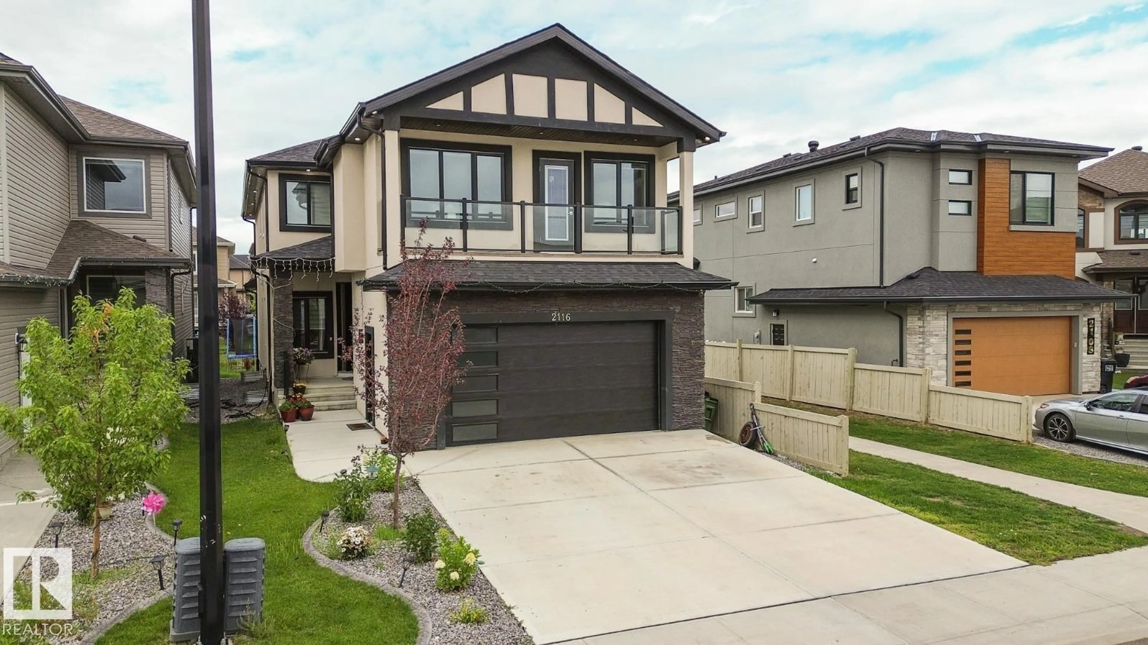 Home with brick exterior material, street for 2116 20 AV, Edmonton Alberta T6T2L2