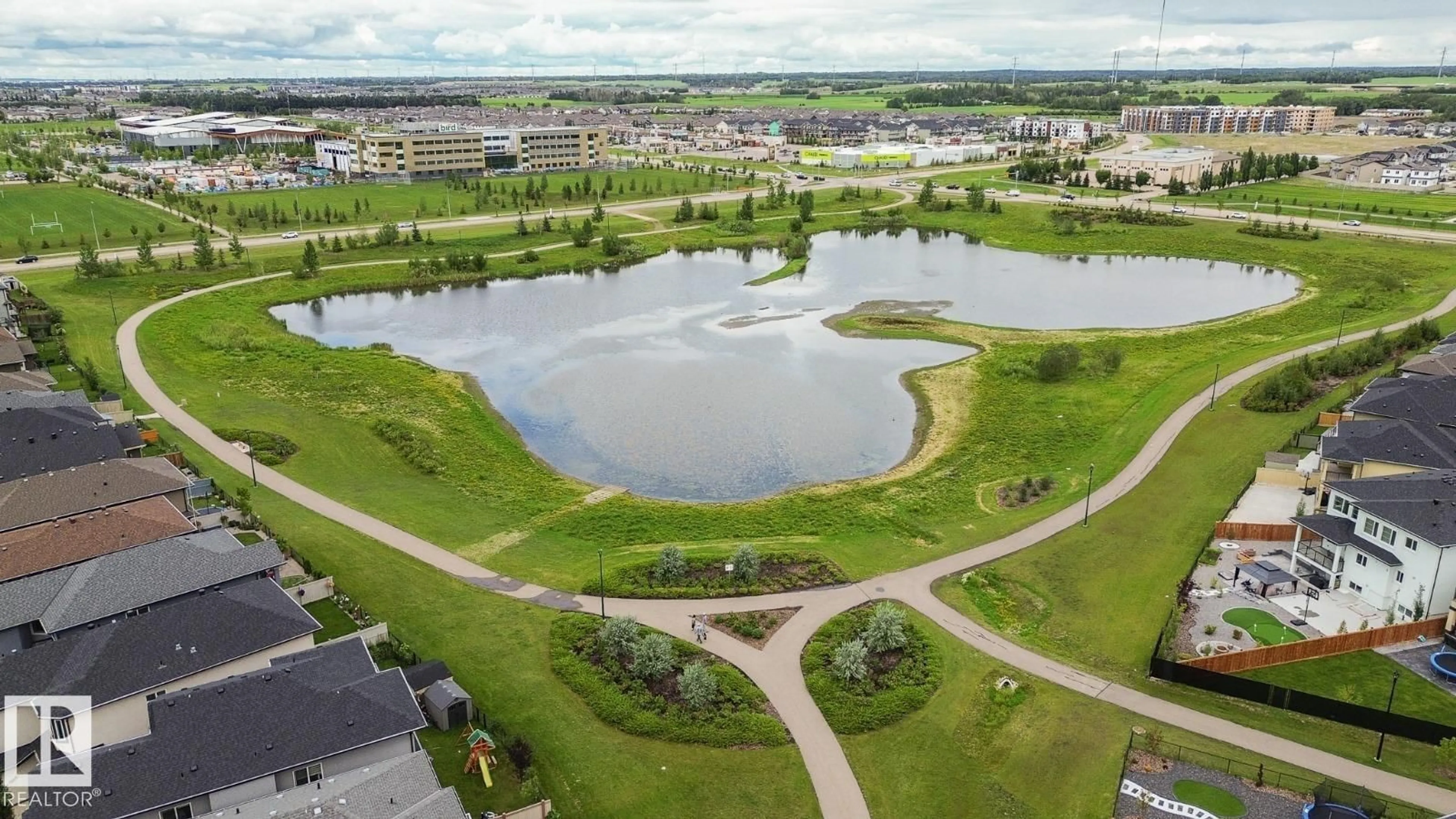 A pic from outside/outdoor area/front of a property/back of a property/a pic from drone, water/lake/river/ocean view for 2116 20 AV, Edmonton Alberta T6T2L2
