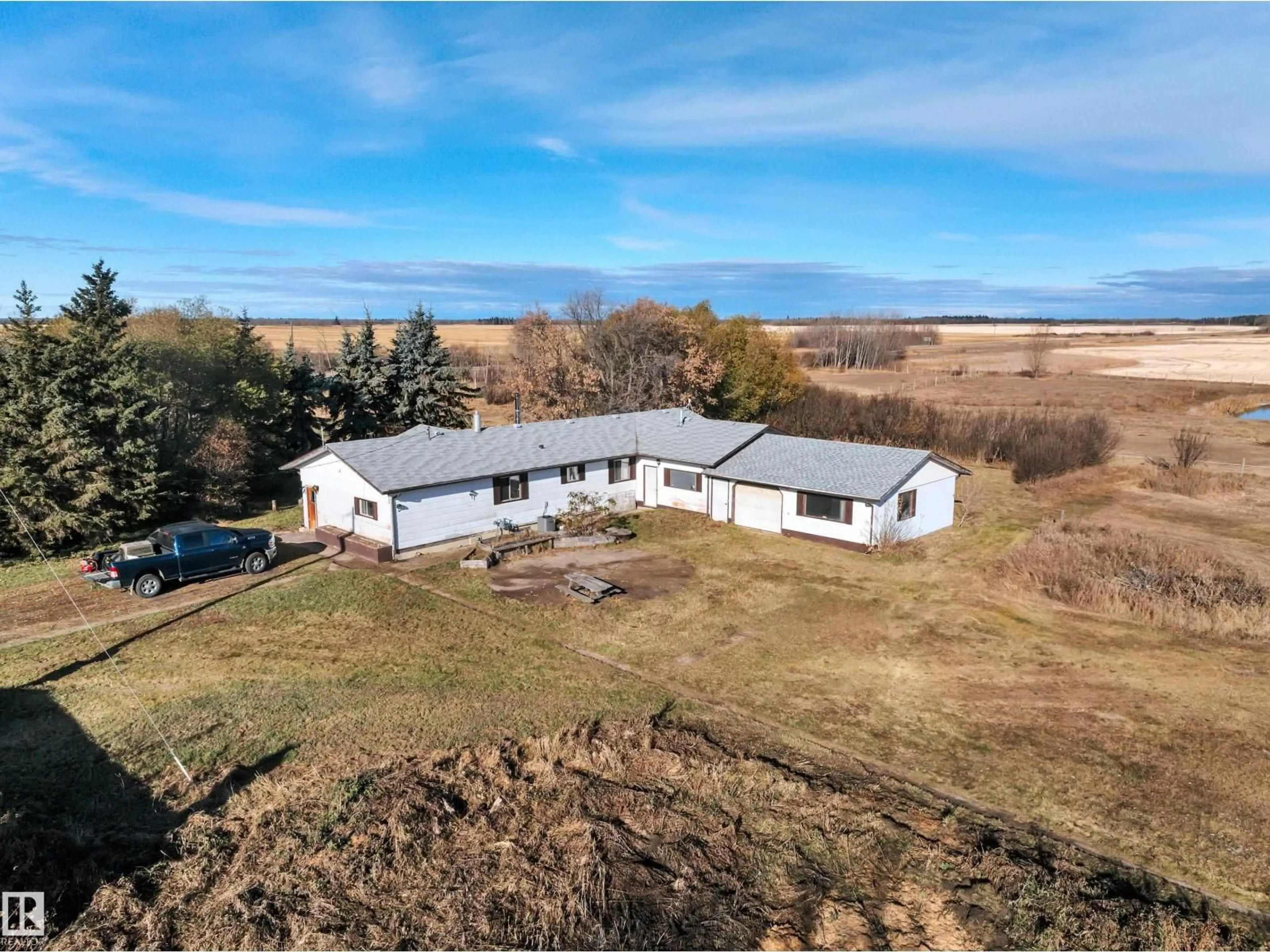 A pic from outside/outdoor area/front of a property/back of a property/a pic from drone, unknown for 60101 HWY 827, Rural Thorhild County Alberta T0A3J0