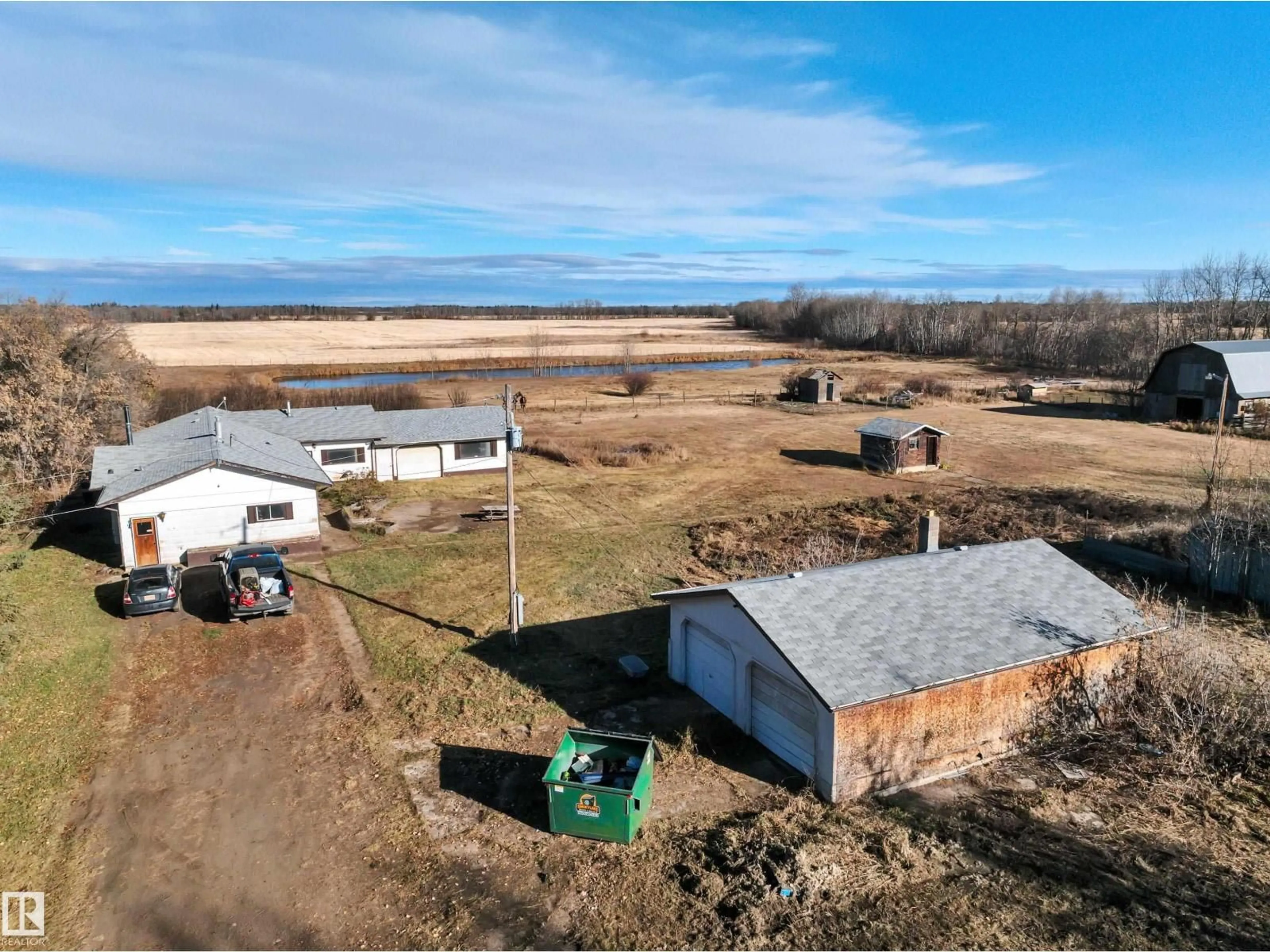 A pic from outside/outdoor area/front of a property/back of a property/a pic from drone, unknown for 60101 HWY 827, Rural Thorhild County Alberta T0A3J0