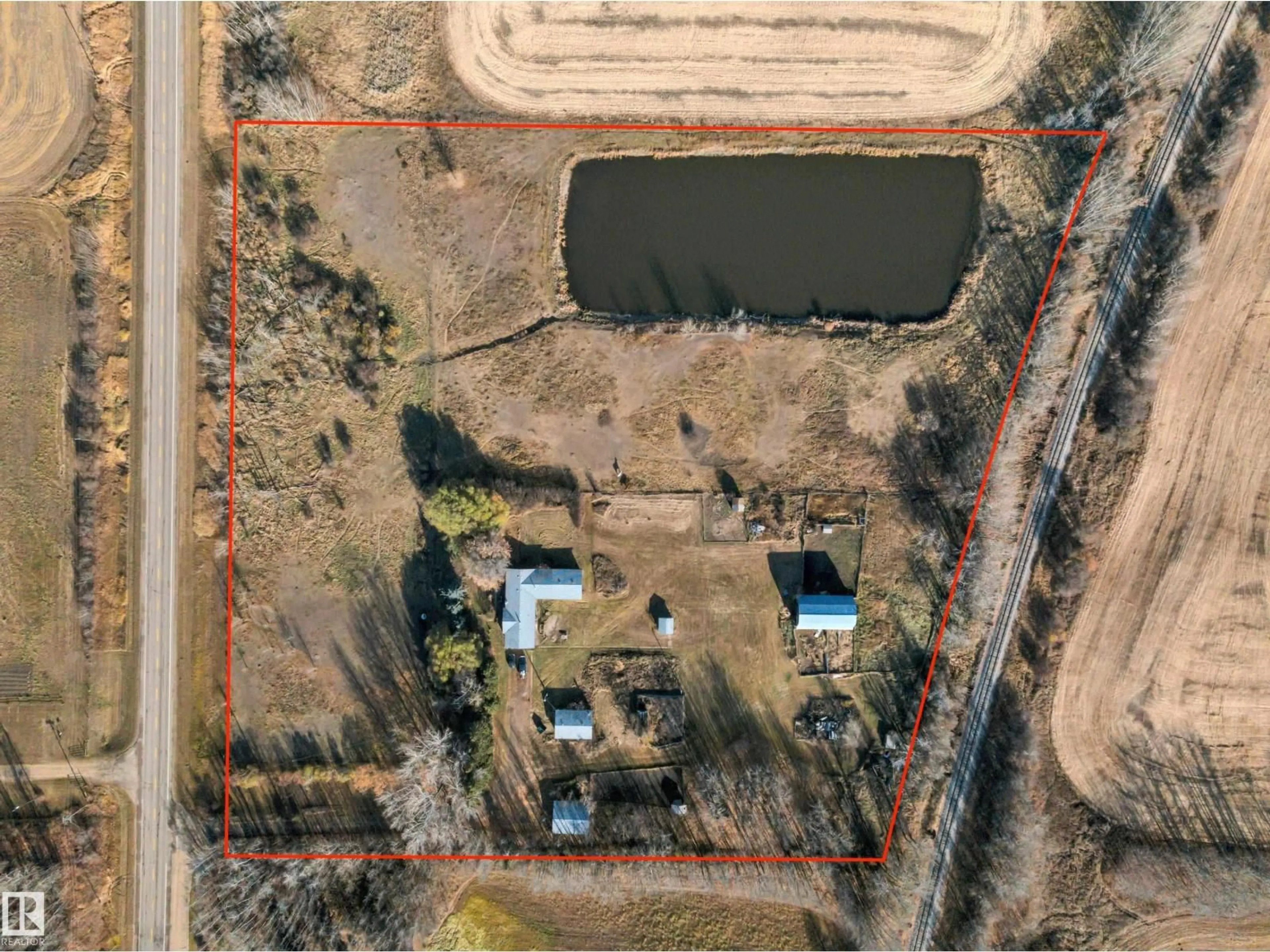 A pic from outside/outdoor area/front of a property/back of a property/a pic from drone, water/lake/river/ocean view for 60101 HWY 827, Rural Thorhild County Alberta T0A3J0