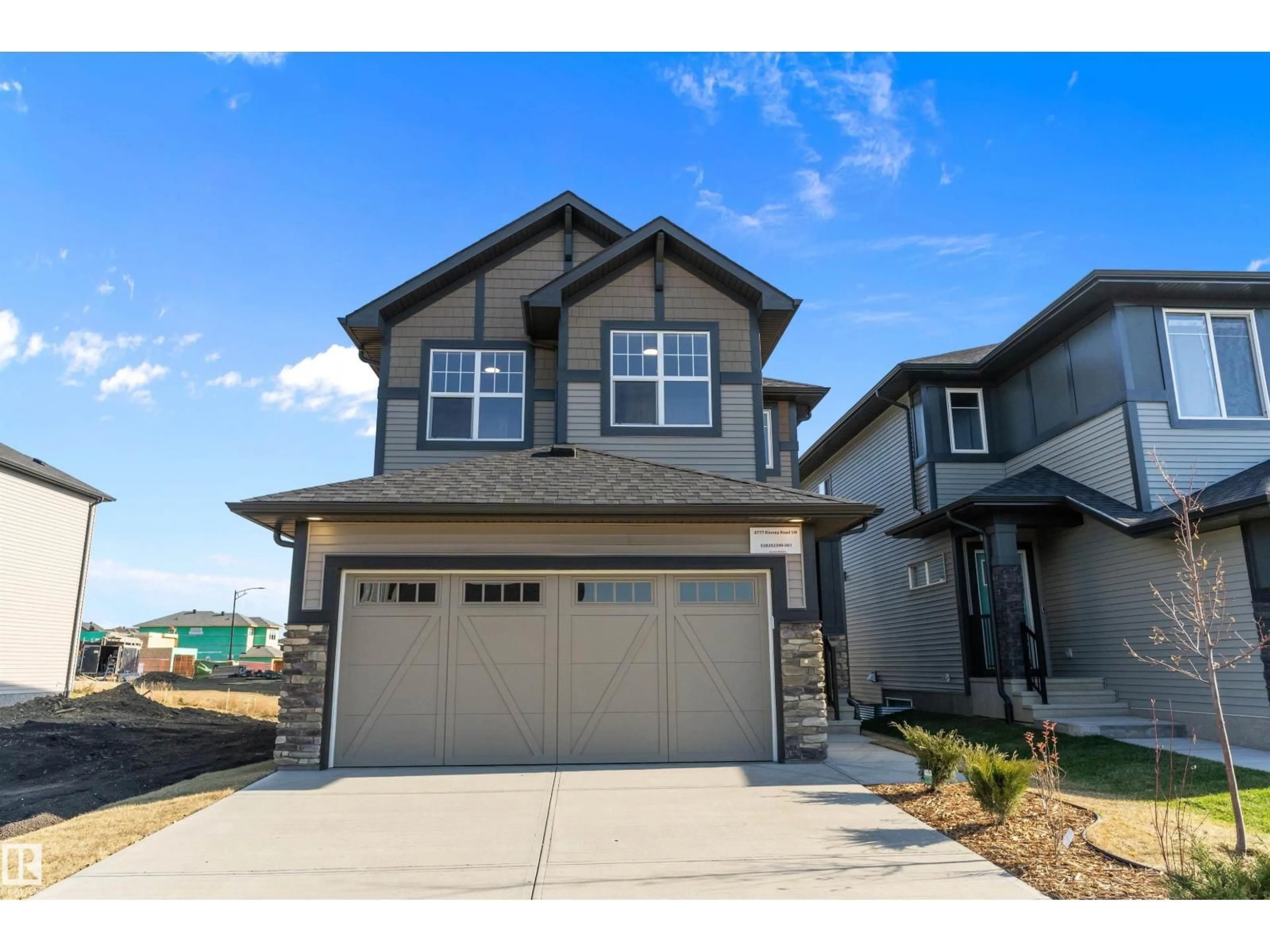 Home with vinyl exterior material, street for 4777 KINNEY RD, Edmonton Alberta T6W5G4
