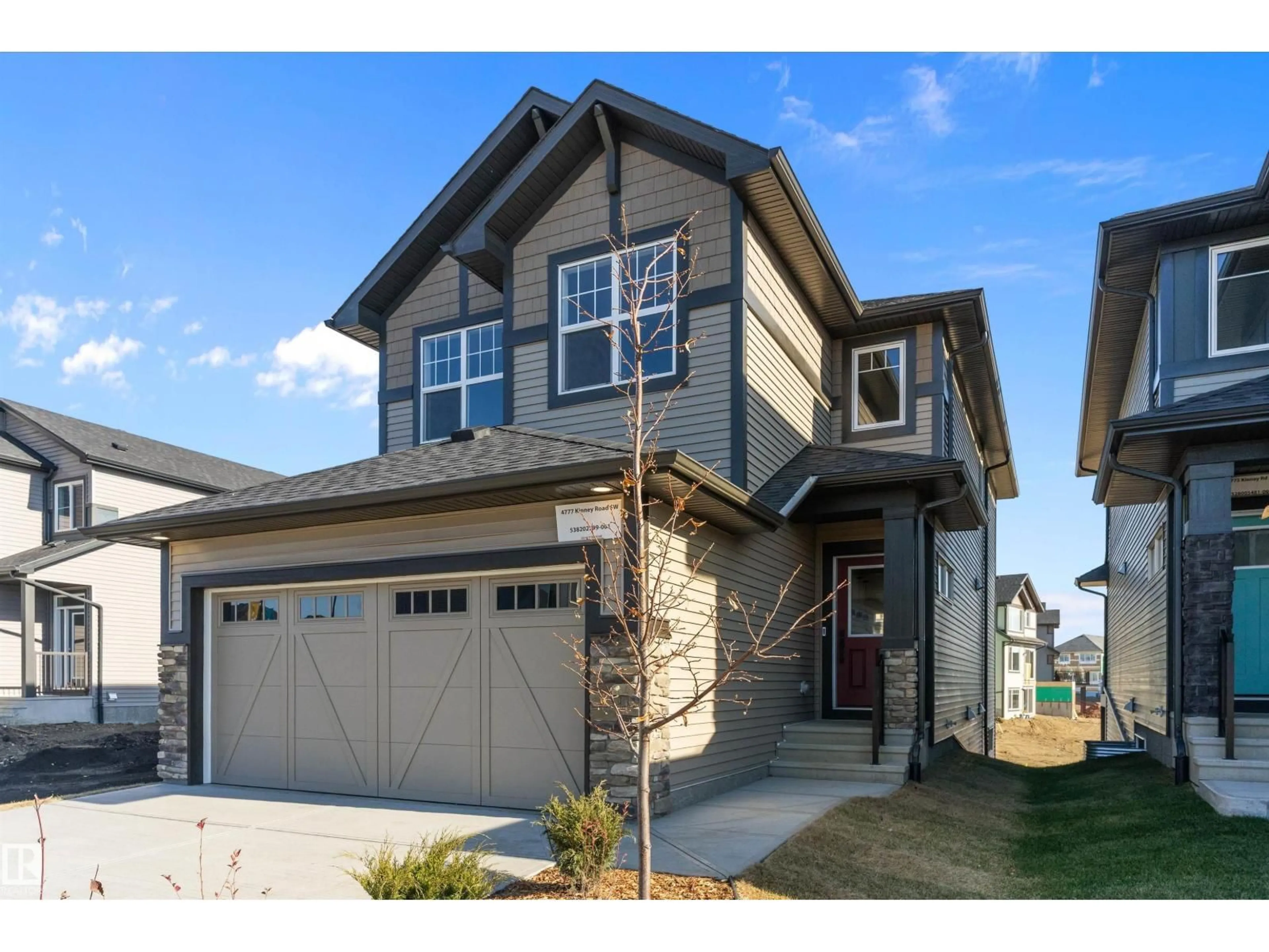 Home with vinyl exterior material, street for 4777 KINNEY RD, Edmonton Alberta T6W5G4