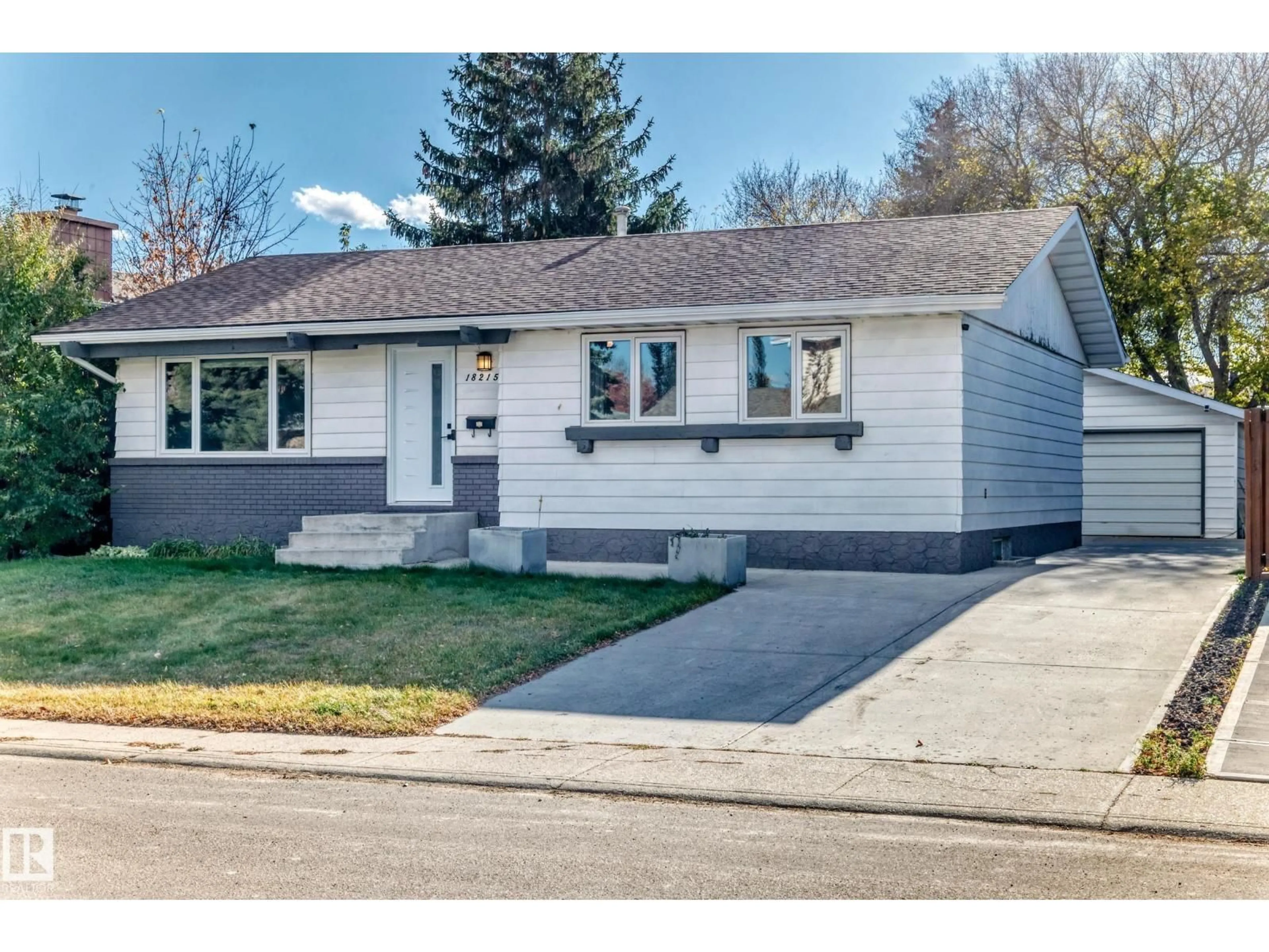 Home with vinyl exterior material, street for 18215 80A AV, Edmonton Alberta T5T0V4