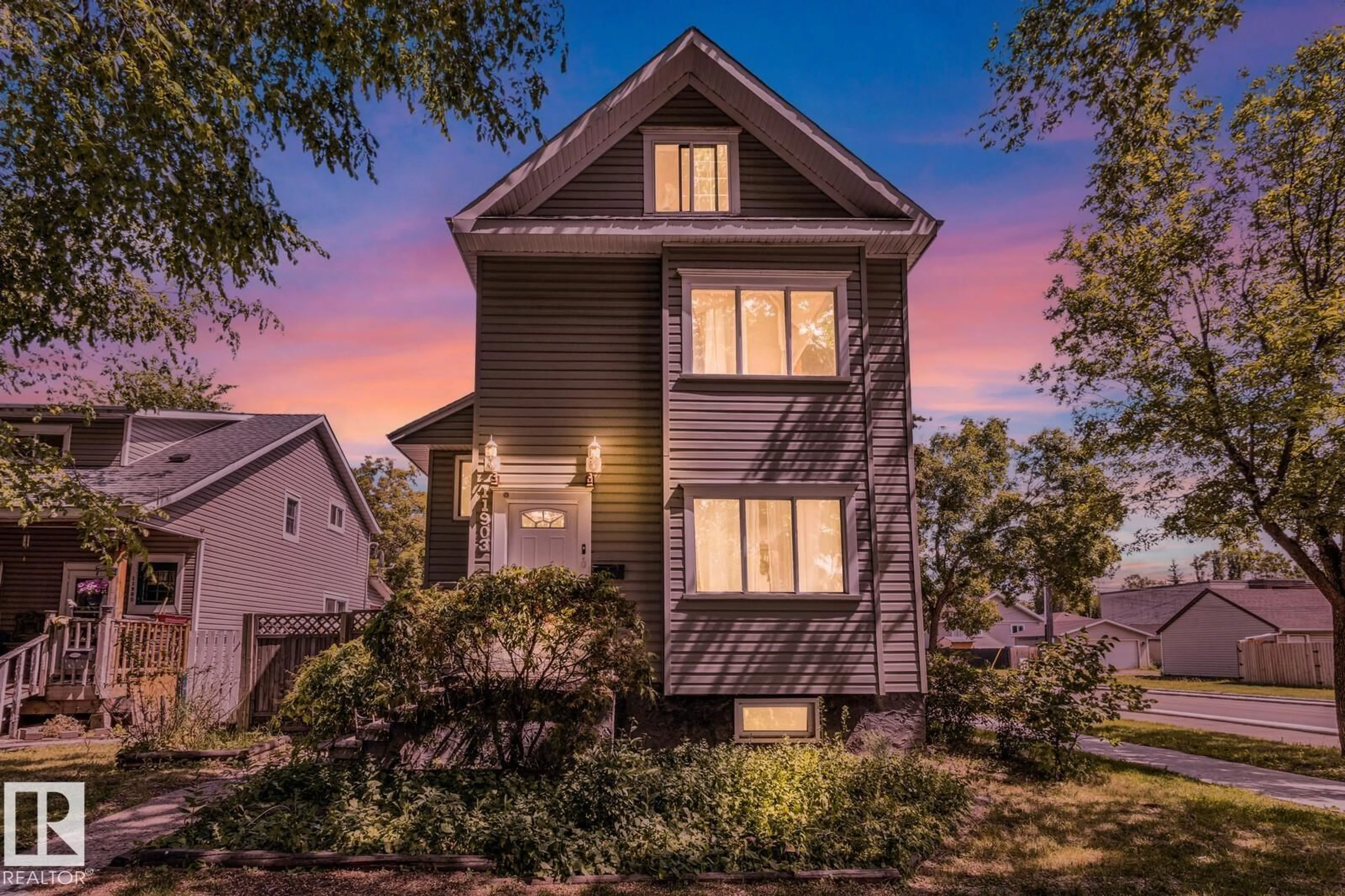 Home with vinyl exterior material, street for NW - 11903 91 ST, Edmonton Alberta T5B4B7