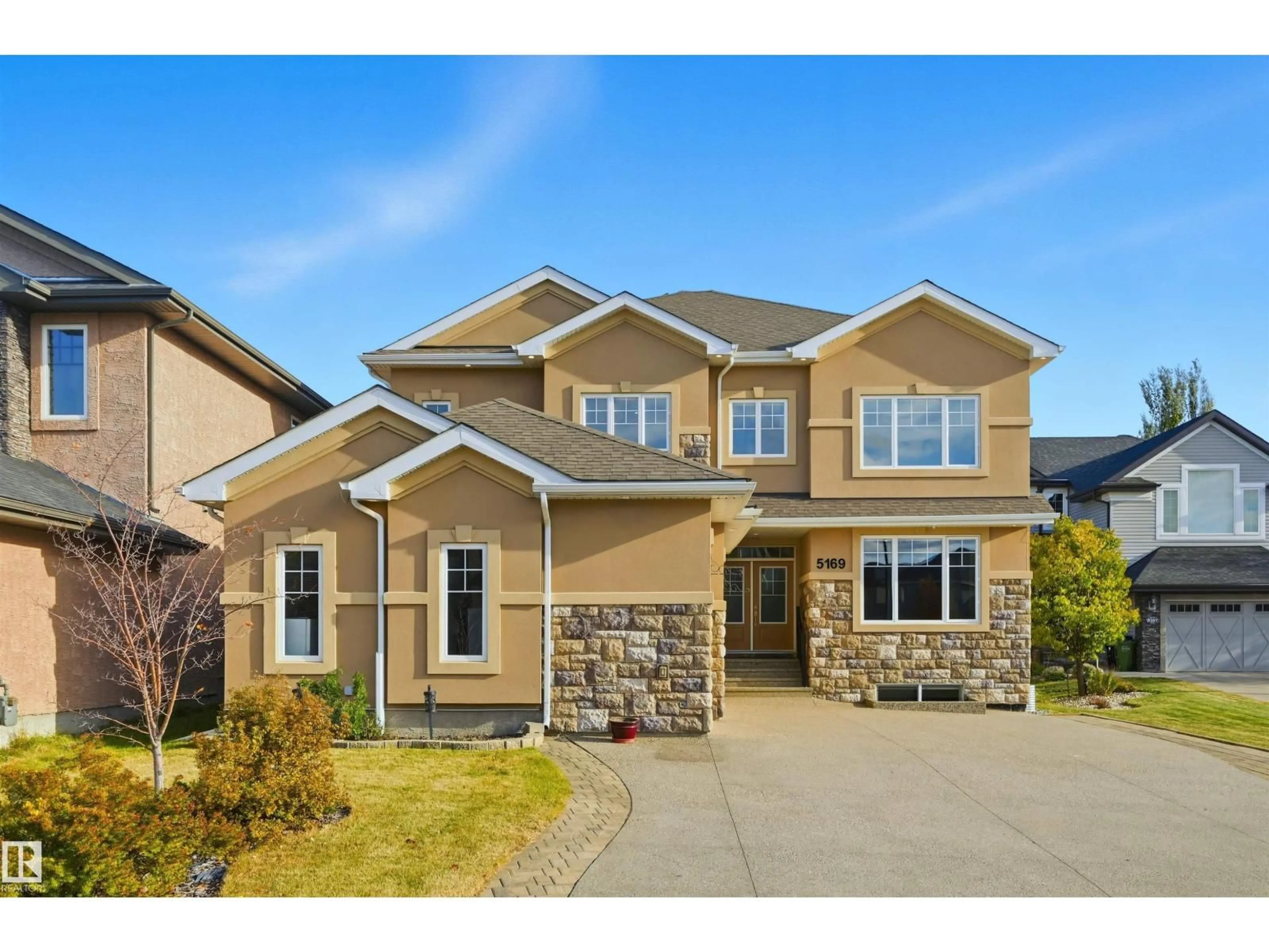 Home with brick exterior material, street for 5169 MULLEN RD, Edmonton Alberta T6R0R2
