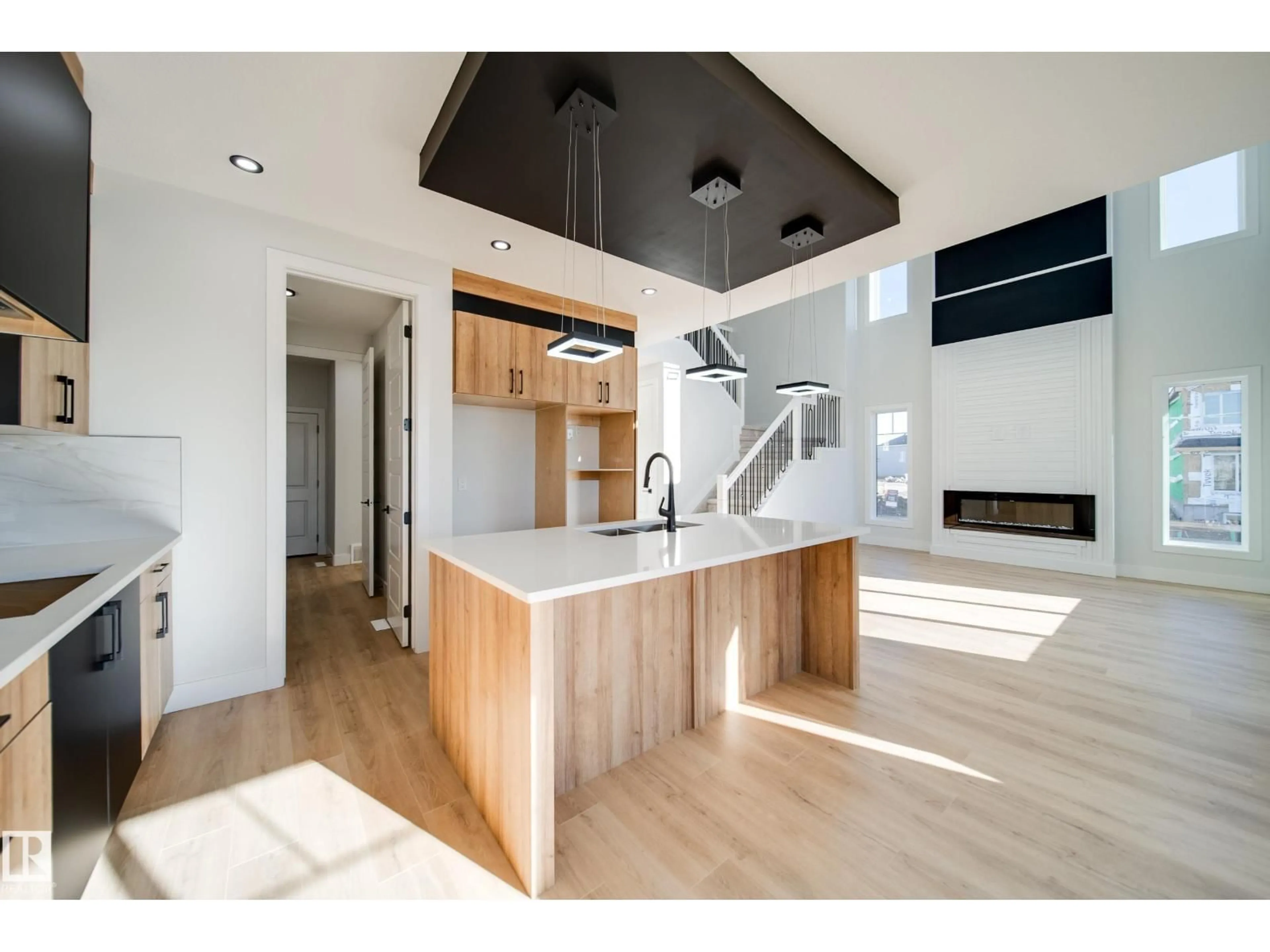 Open concept kitchen, wood/laminate floor for NW - 8511 183 AV, Edmonton Alberta T5Z0X5