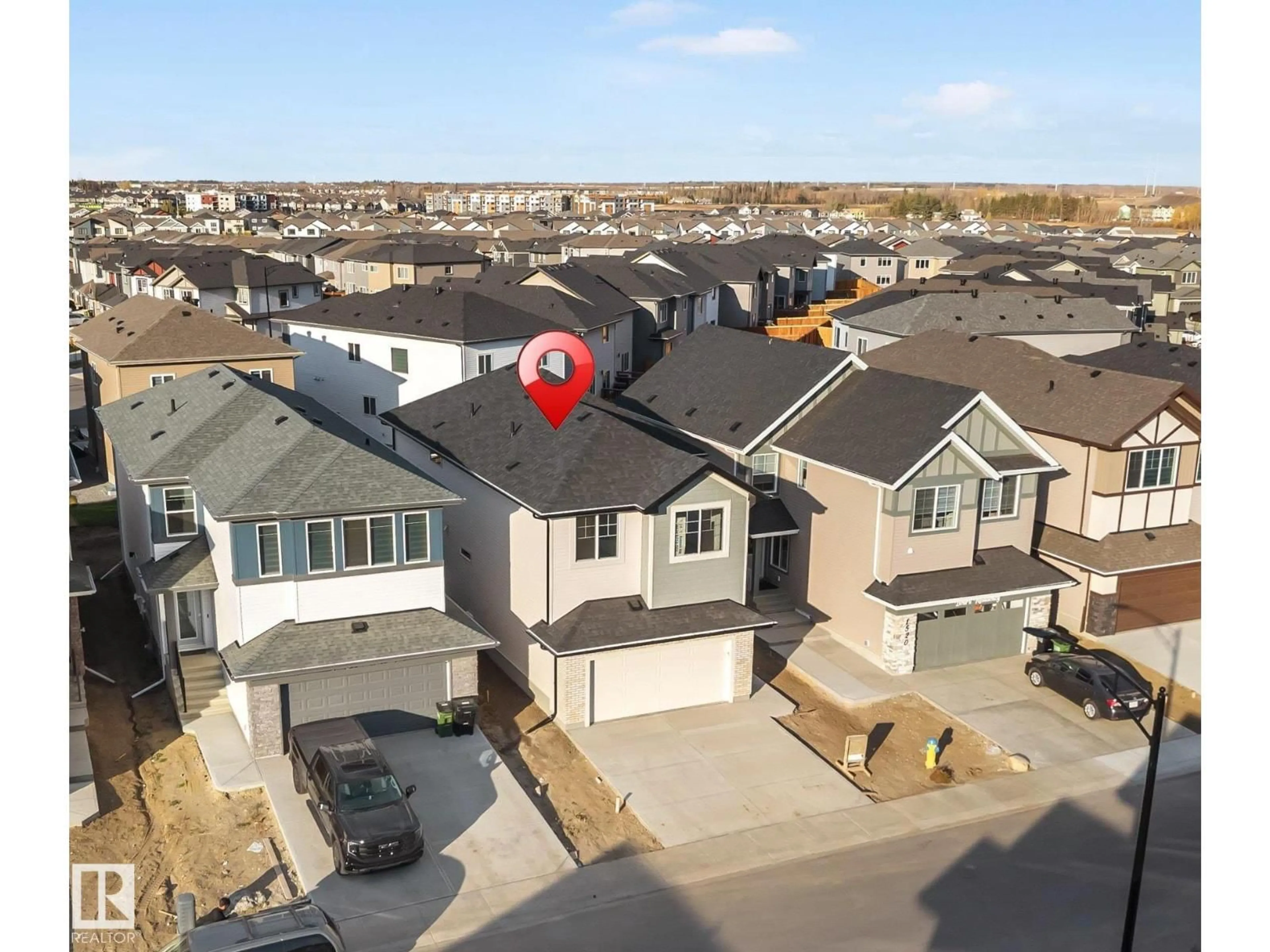 A pic from outside/outdoor area/front of a property/back of a property/a pic from drone, street for NW - 1524 11 AV, Edmonton Alberta T6T2W4