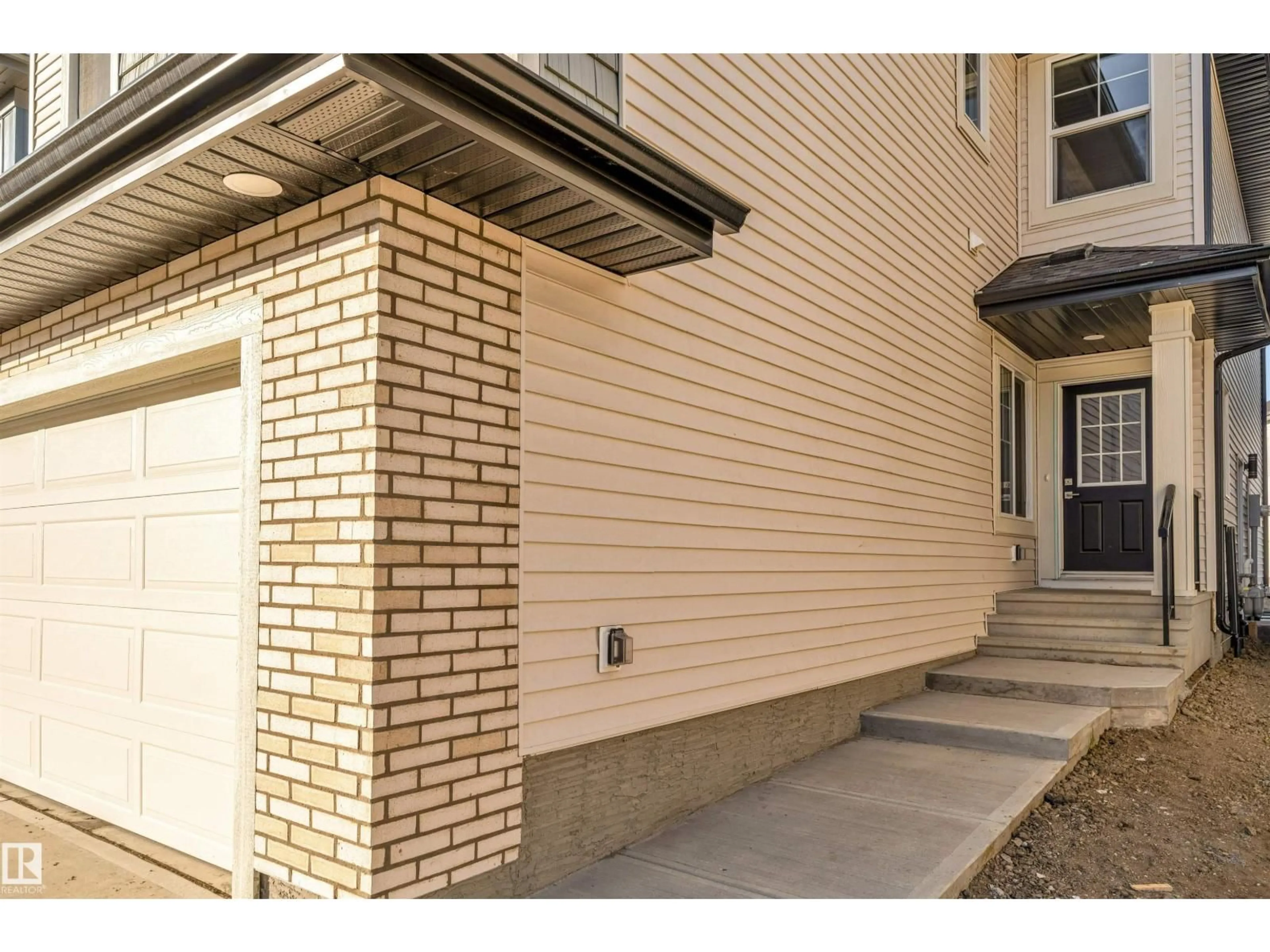 Home with brick exterior material, street for NW - 1524 11 AV, Edmonton Alberta T6T2W4