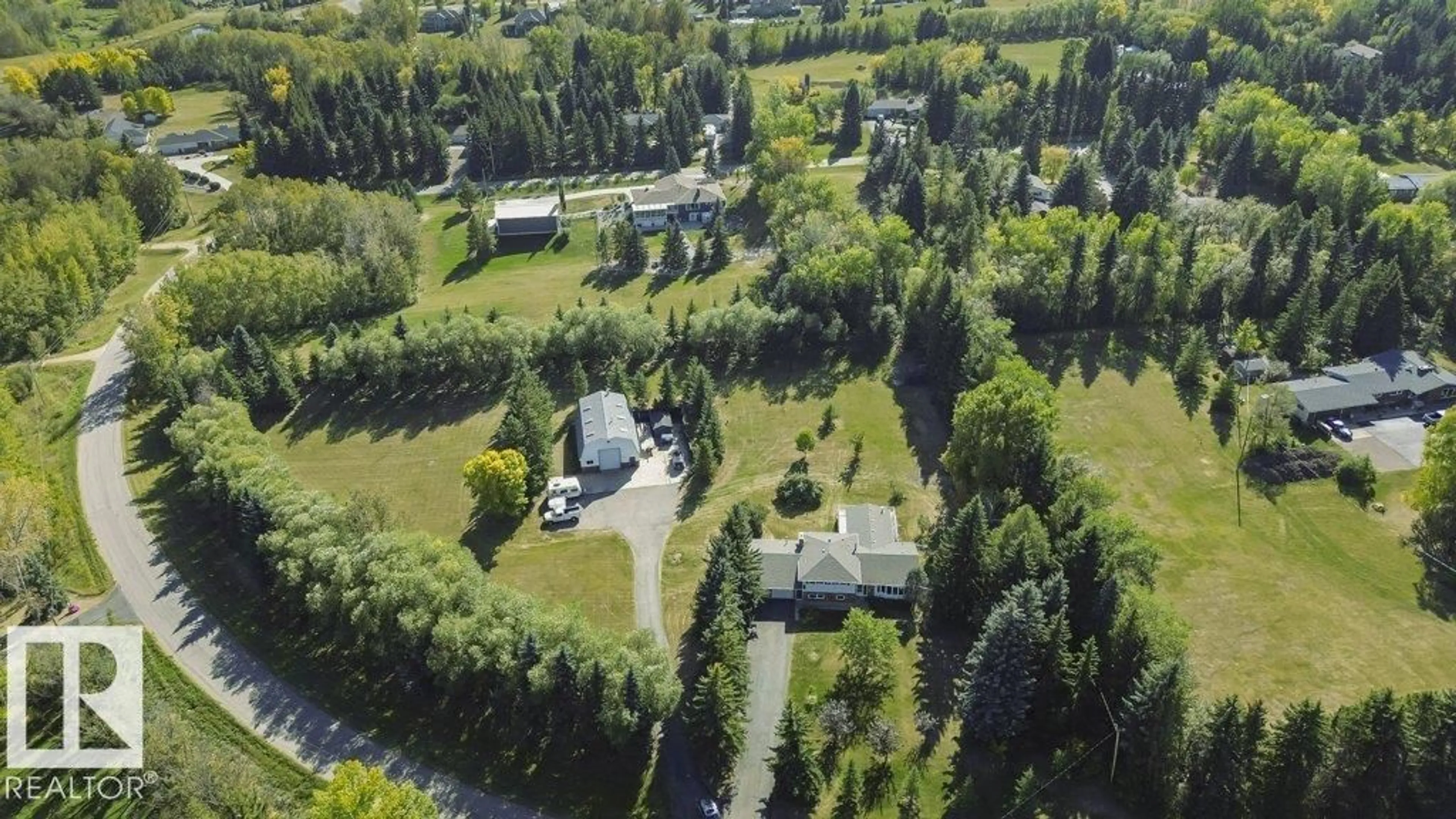A pic from outside/outdoor area/front of a property/back of a property/a pic from drone, forest/trees view for 22555 TWP ROAD 530, Rural Strathcona County Alberta T8A4T7