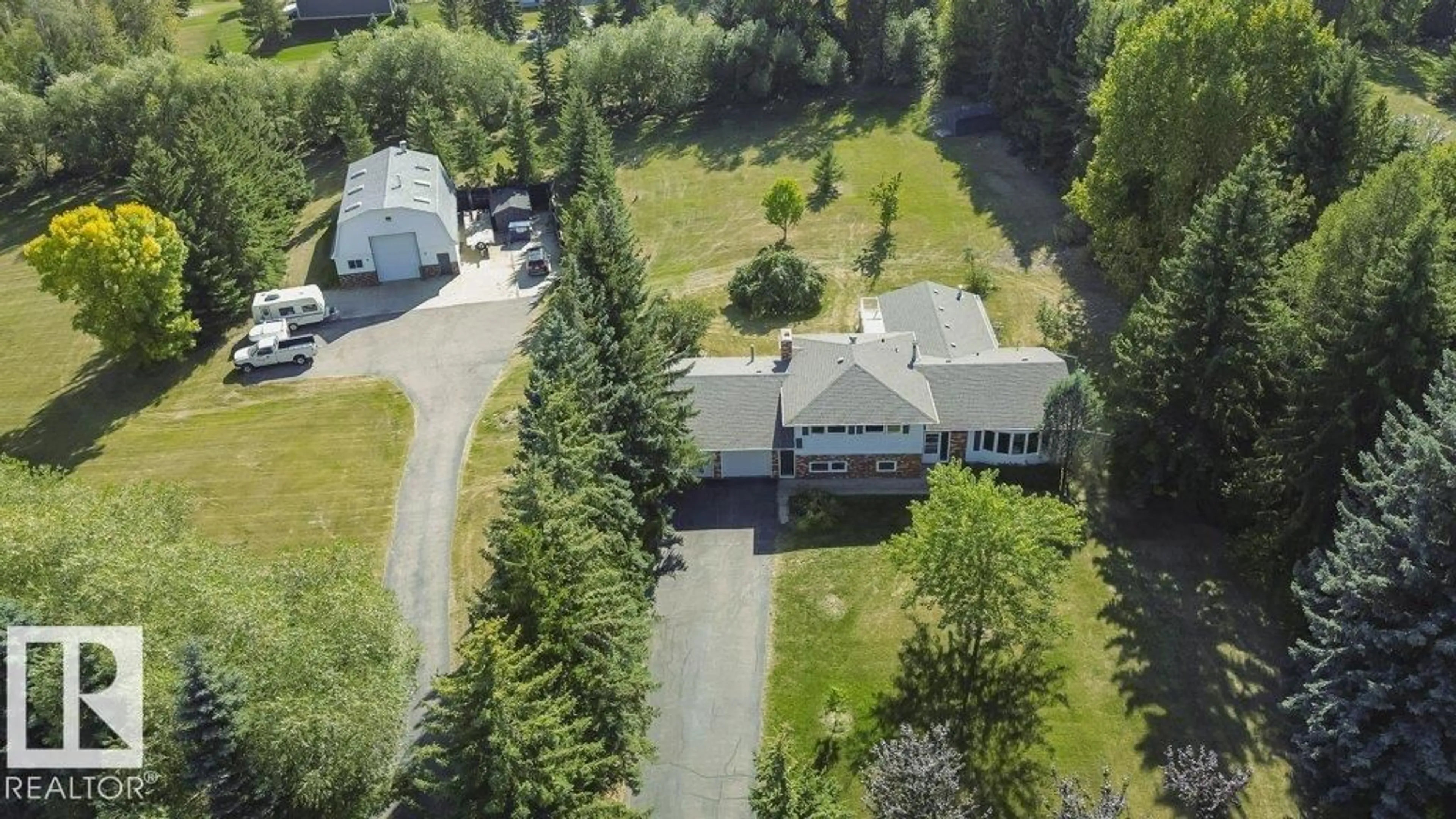 A pic from outside/outdoor area/front of a property/back of a property/a pic from drone, unknown for 22555 TWP ROAD 530, Rural Strathcona County Alberta T8A4T7