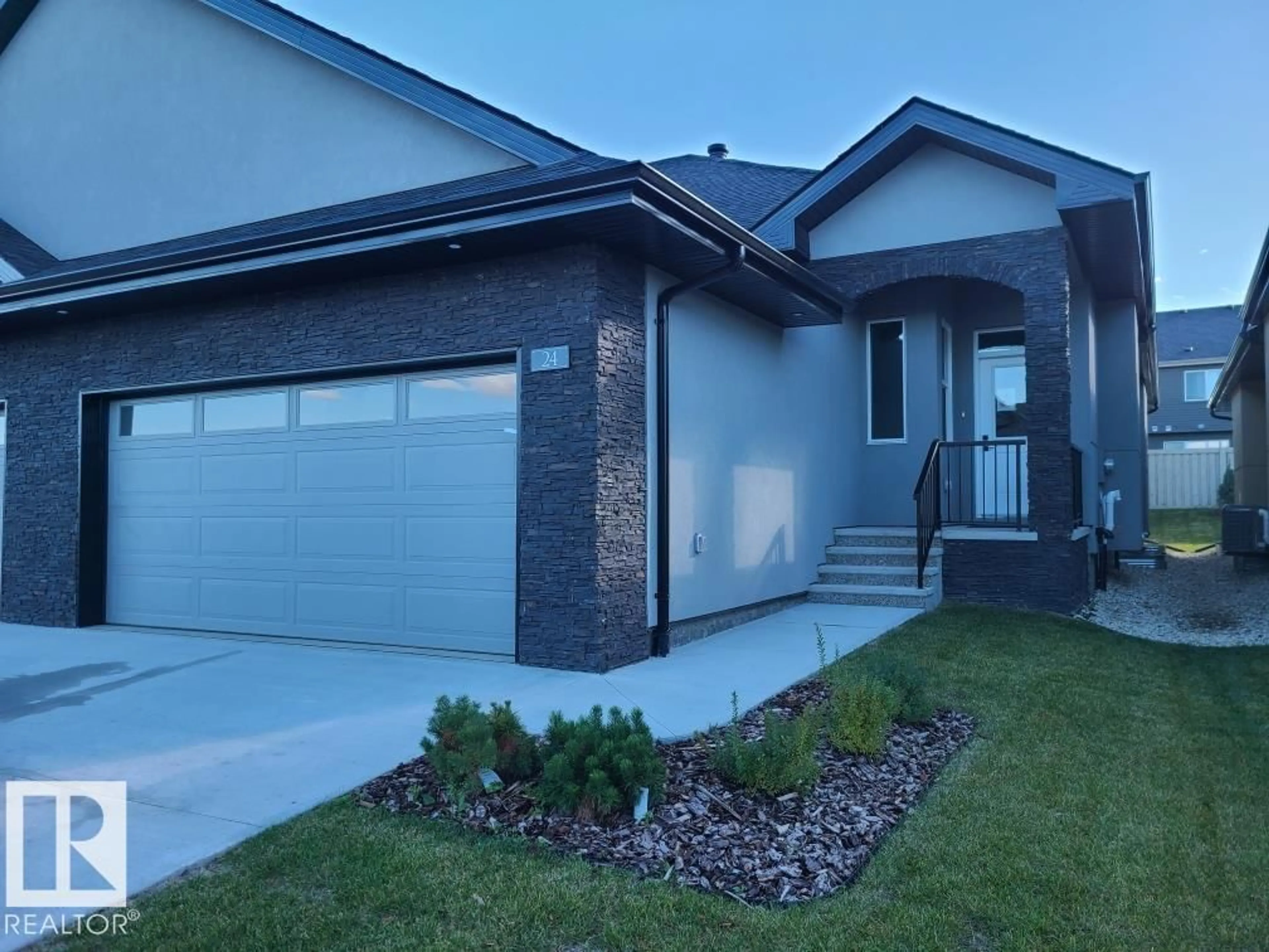 Home with vinyl exterior material, street for 24 - 104 ALLARD LI, Edmonton Alberta T6W2N2