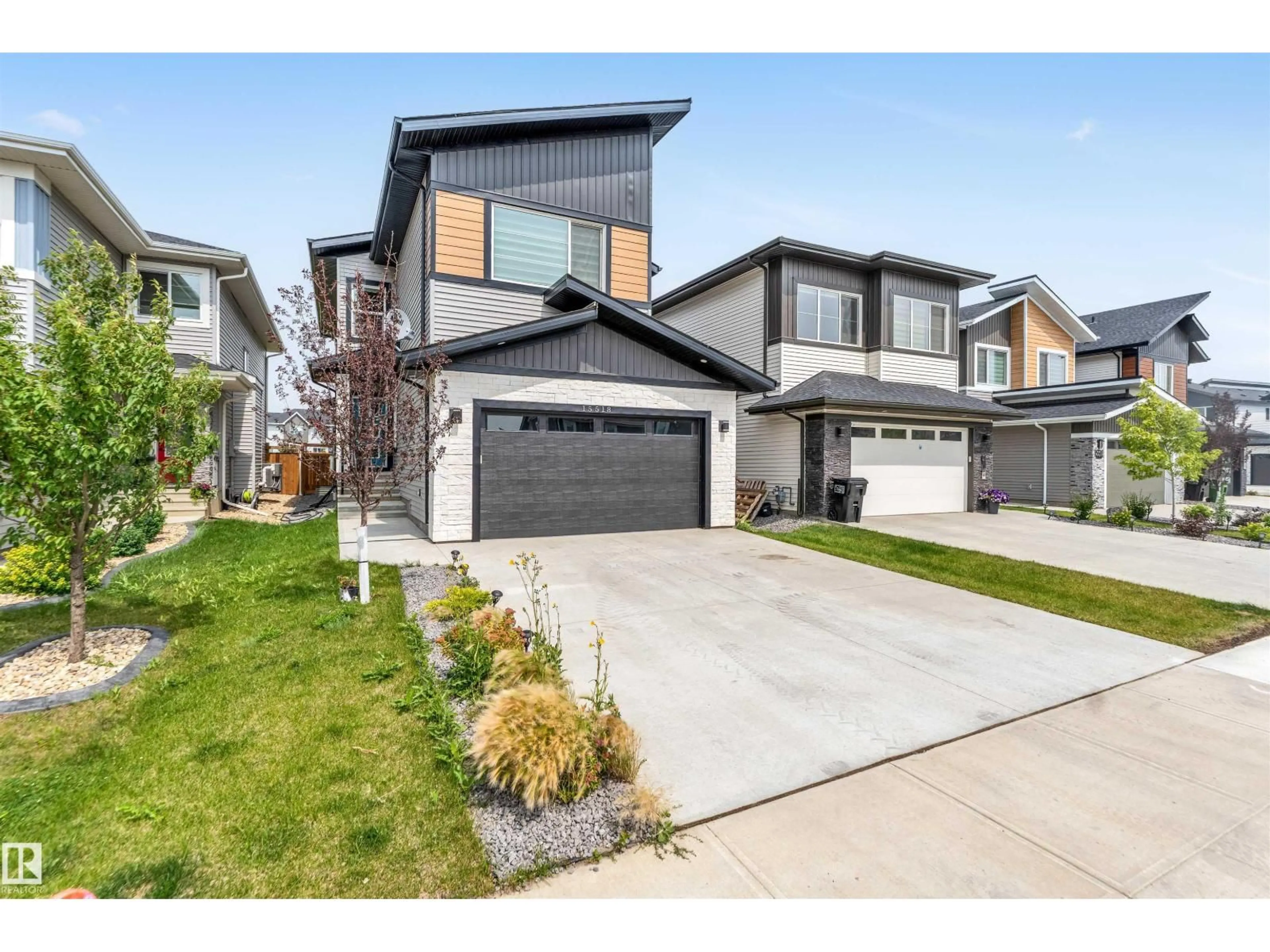 Home with brick exterior material, street for SW - 15518 13A AV, Edmonton Alberta T6W1A4