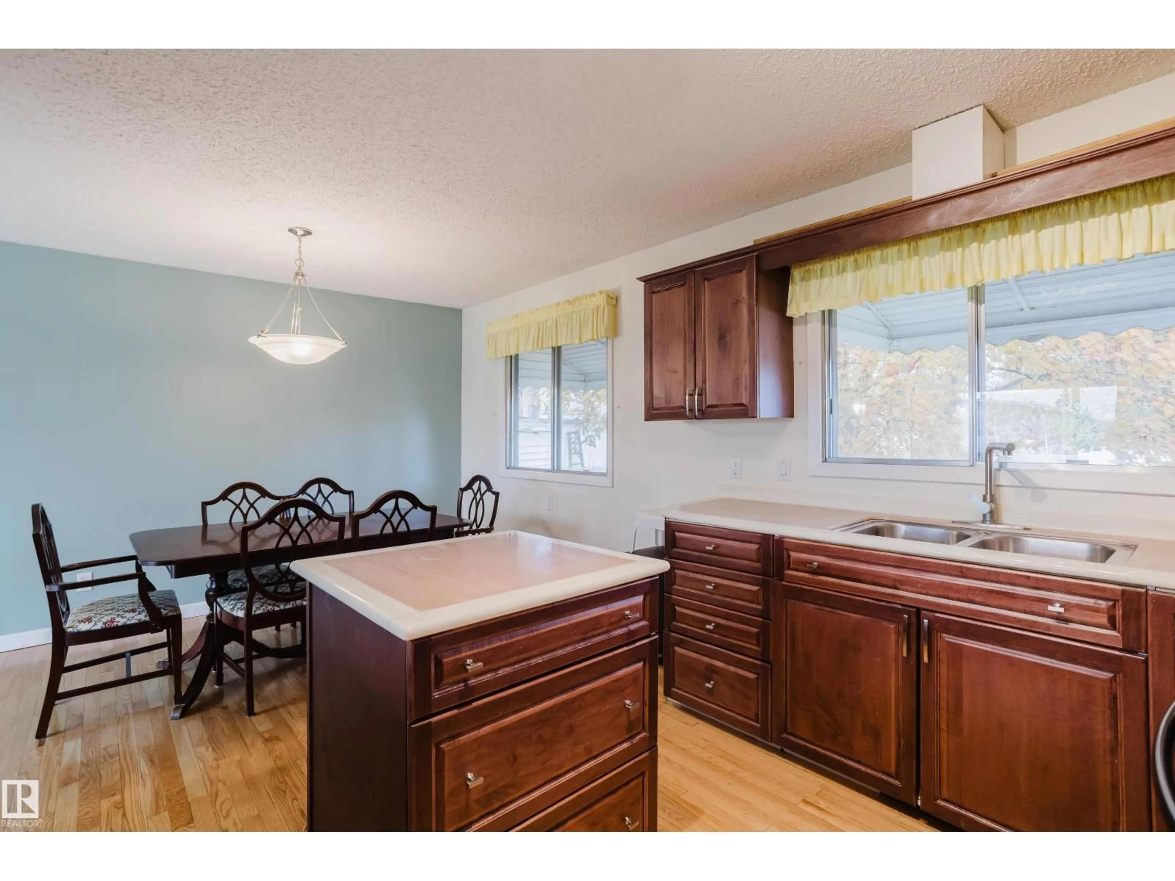 Open concept kitchen, wood/laminate floor for 4406 44 ST, Stony Plain Alberta T7Z1J3