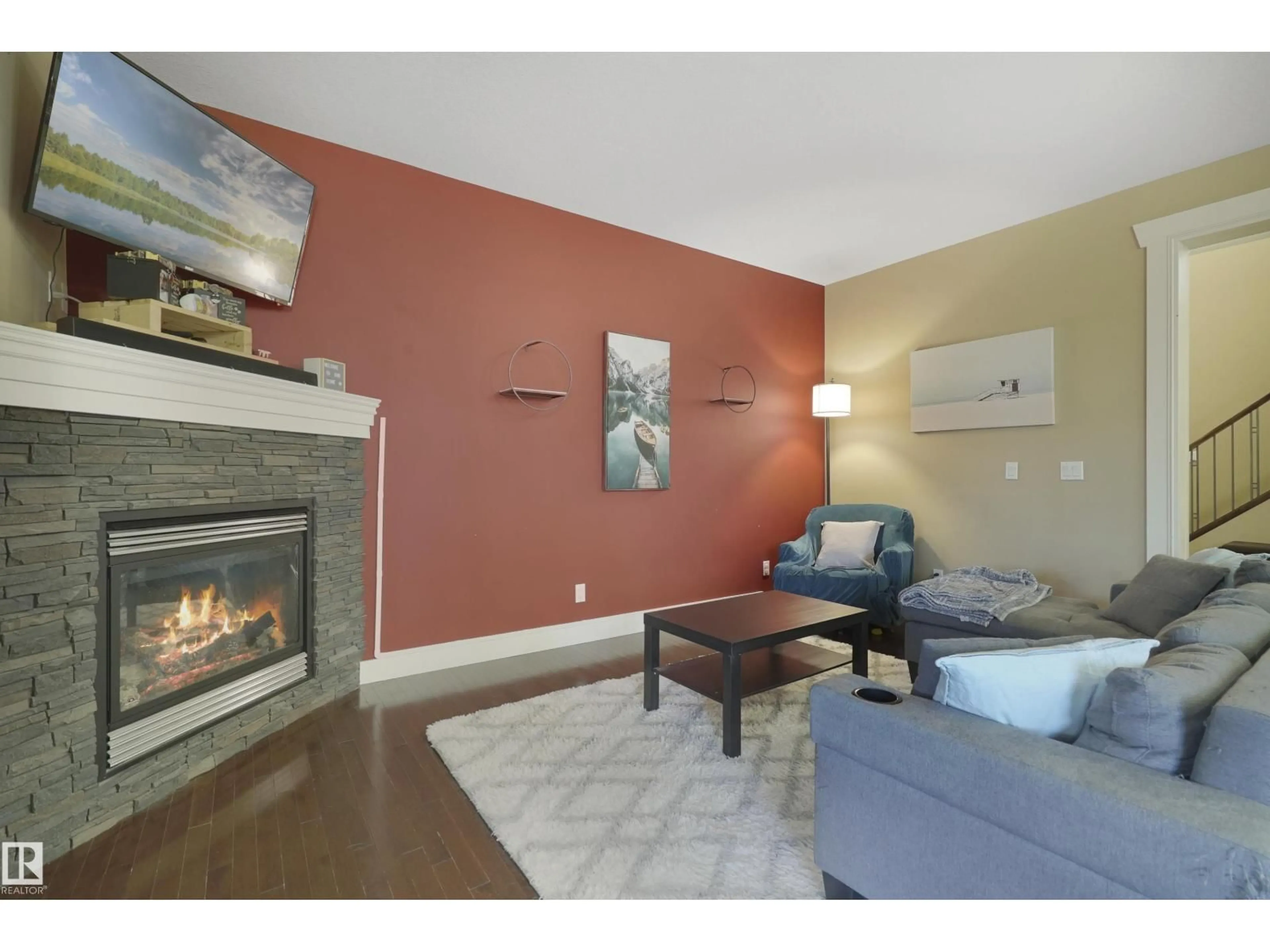 Living room with furniture, wood/laminate floor for 30 HILLDOWNS DR, Spruce Grove Alberta T7X0J2