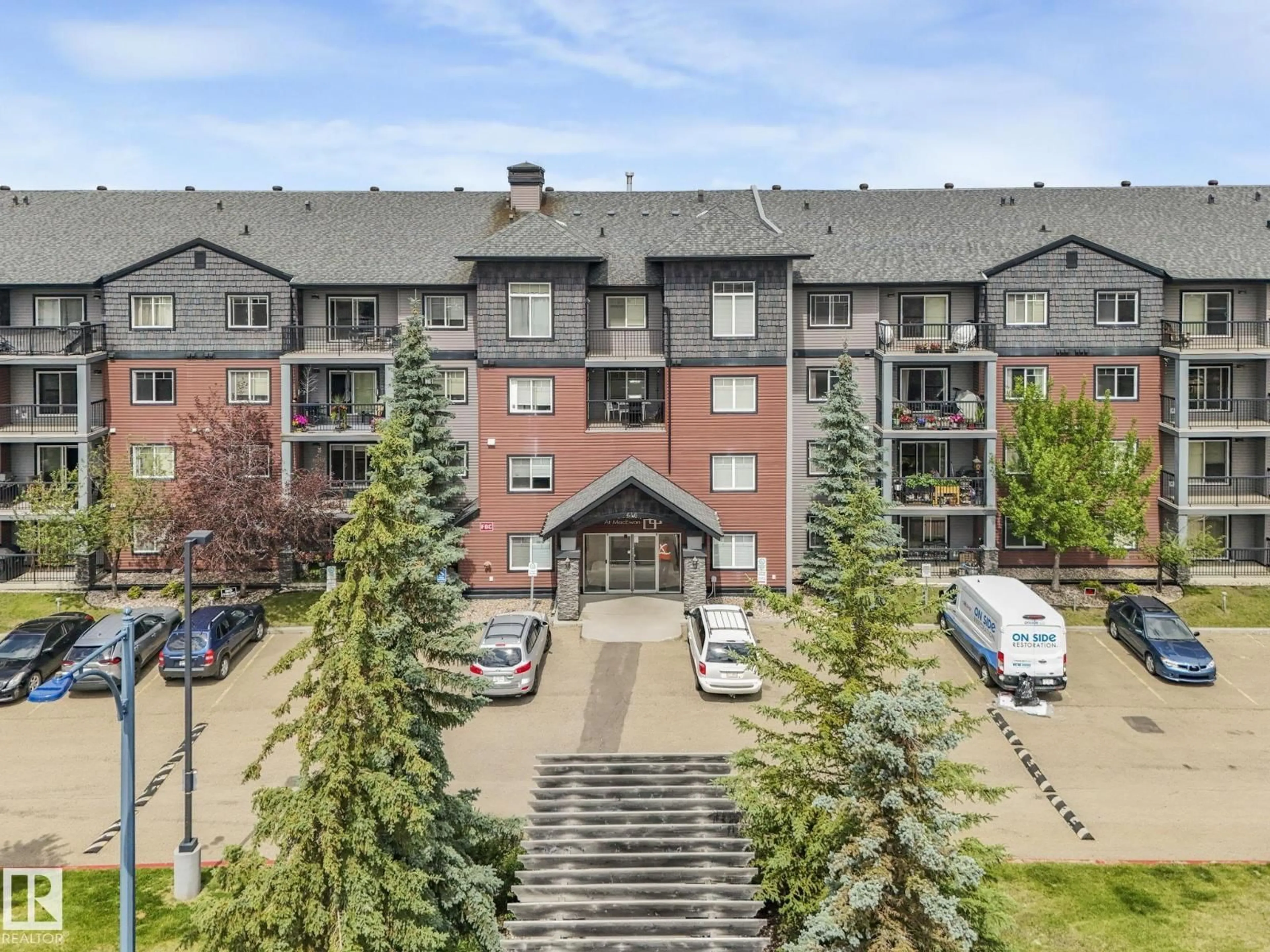 A pic from outside/outdoor area/front of a property/back of a property/a pic from drone, unknown for #110 - 646 MCALLISTER LO, Edmonton Alberta T6W0B5