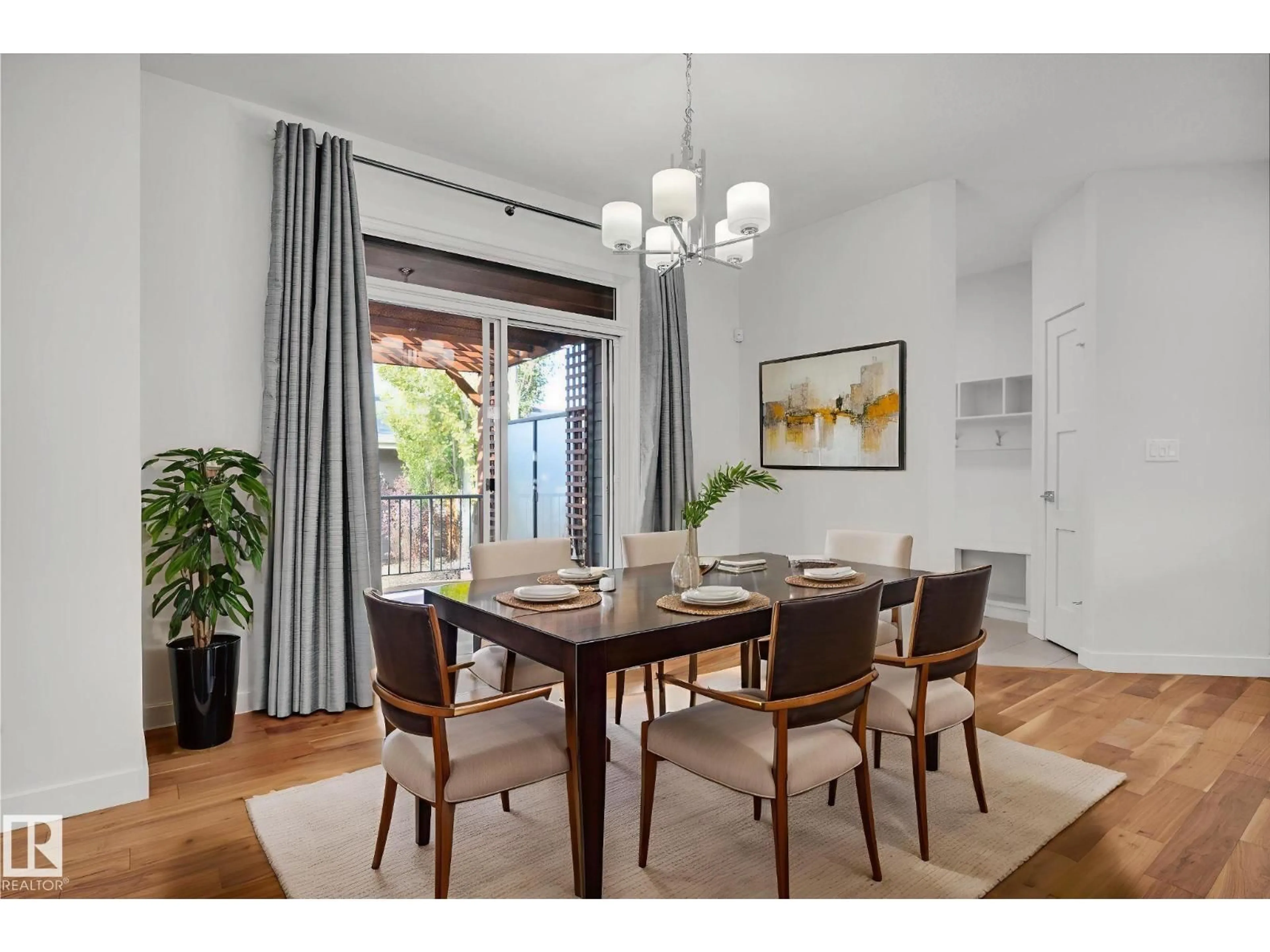 Dining room, wood/laminate floor for 7142 CR NW, Edmonton Alberta T6R0V9