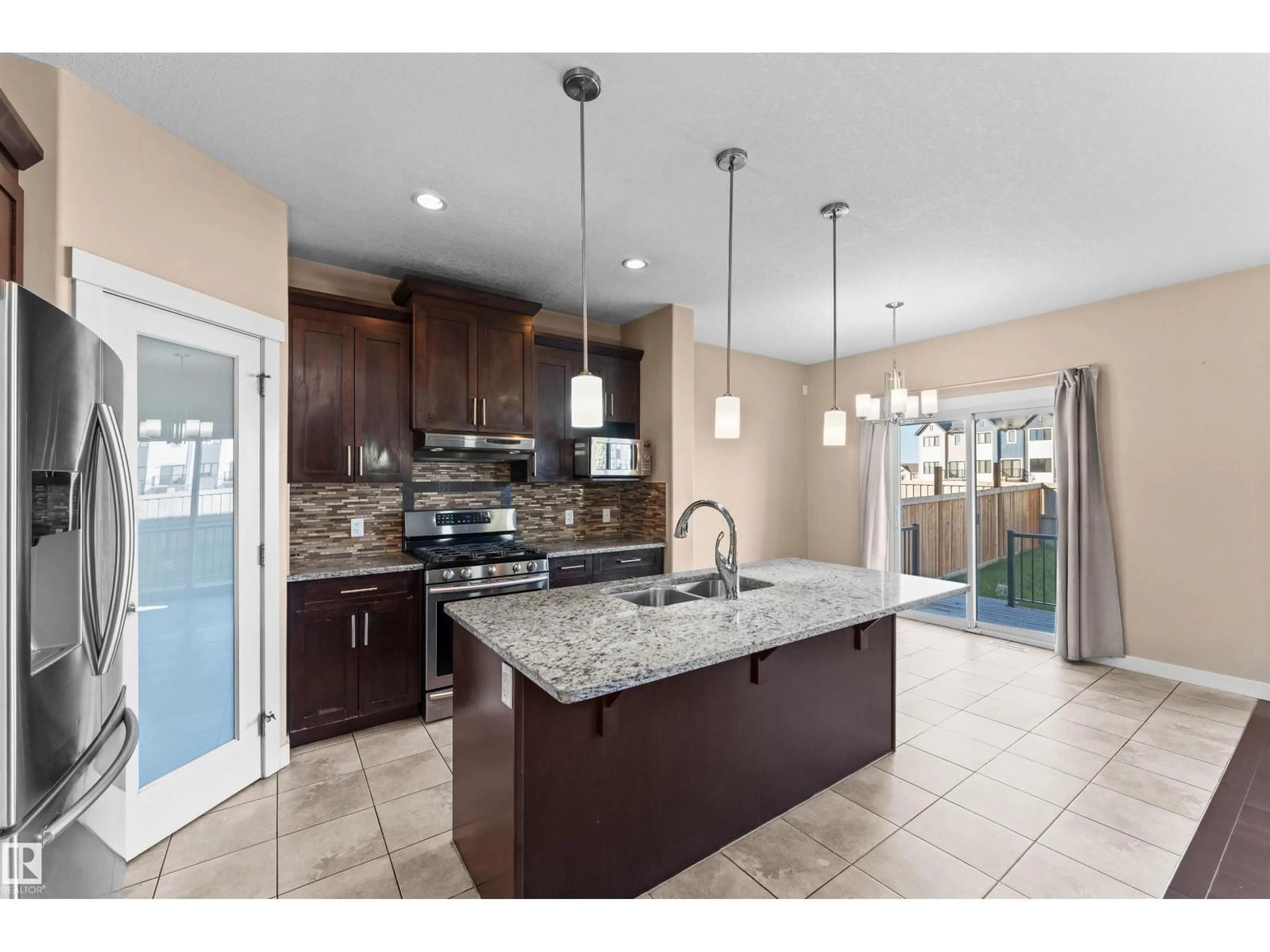 Open concept kitchen, ceramic/tile floor for 3674 CLAXTON PL, Edmonton Alberta T6W2K9