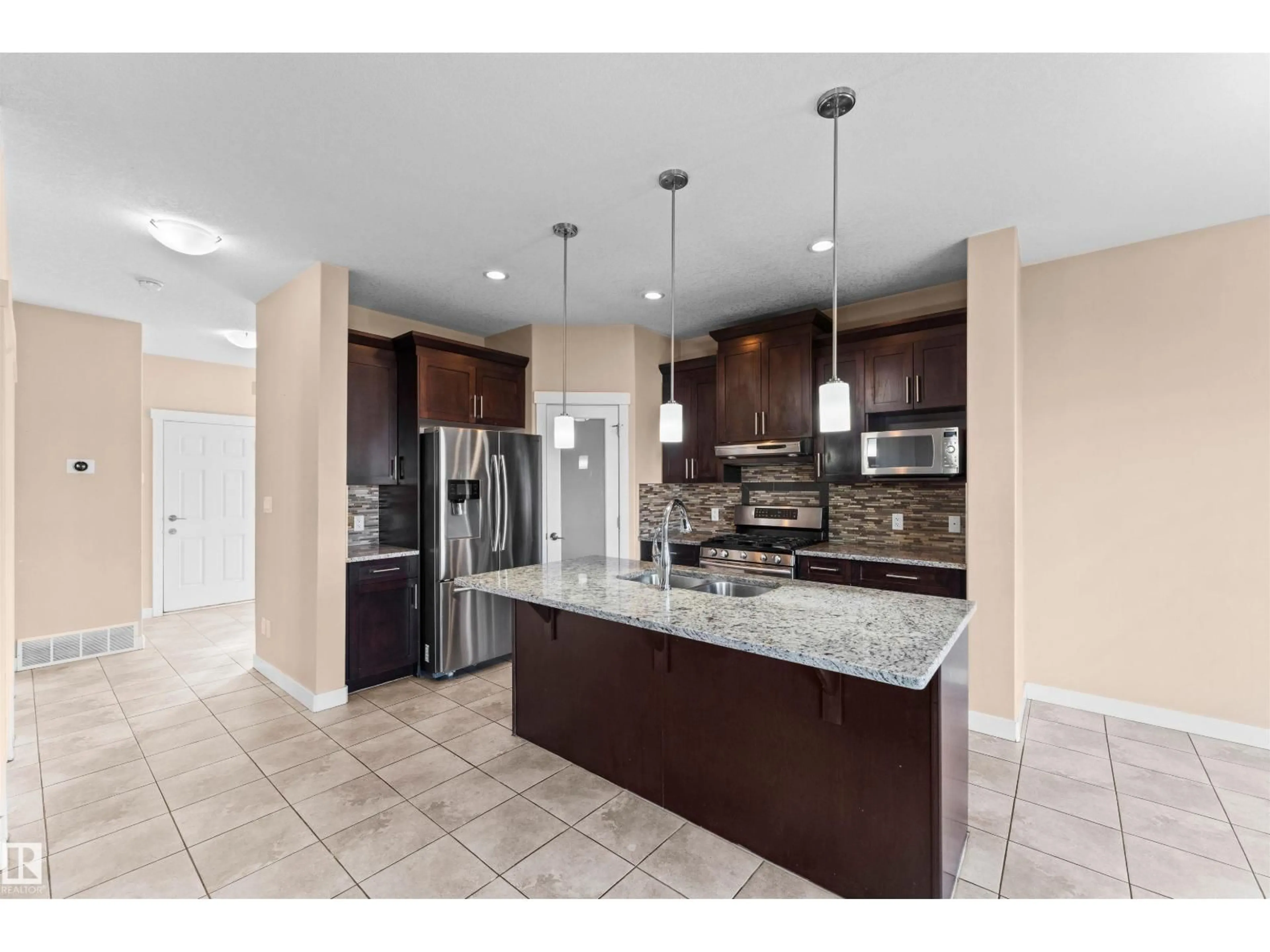 Open concept kitchen, ceramic/tile floor for 3674 CLAXTON PL, Edmonton Alberta T6W2K9