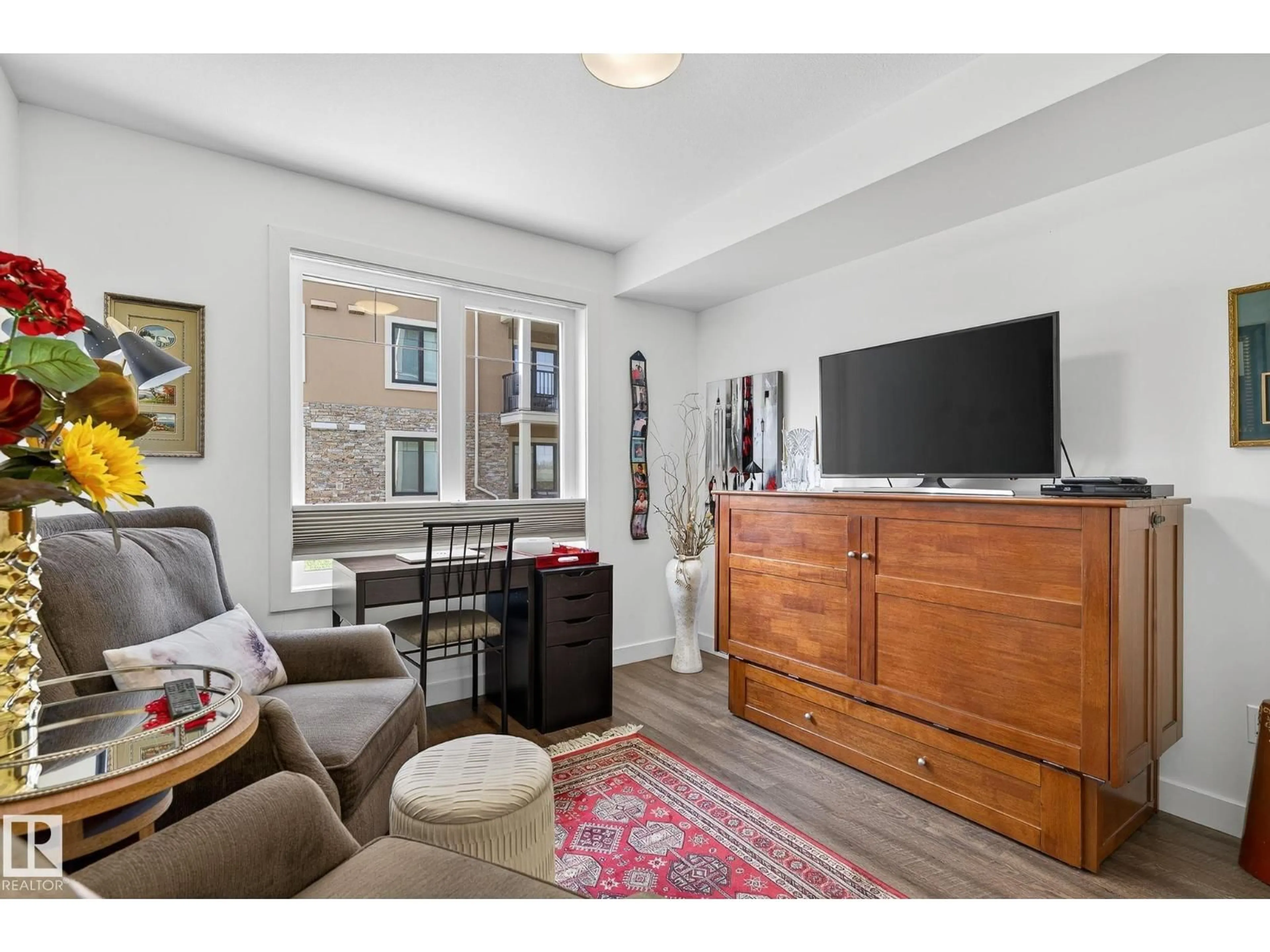 Living room with furniture, unknown for #102 - 1029 173 ST, Edmonton Alberta T6W3E4