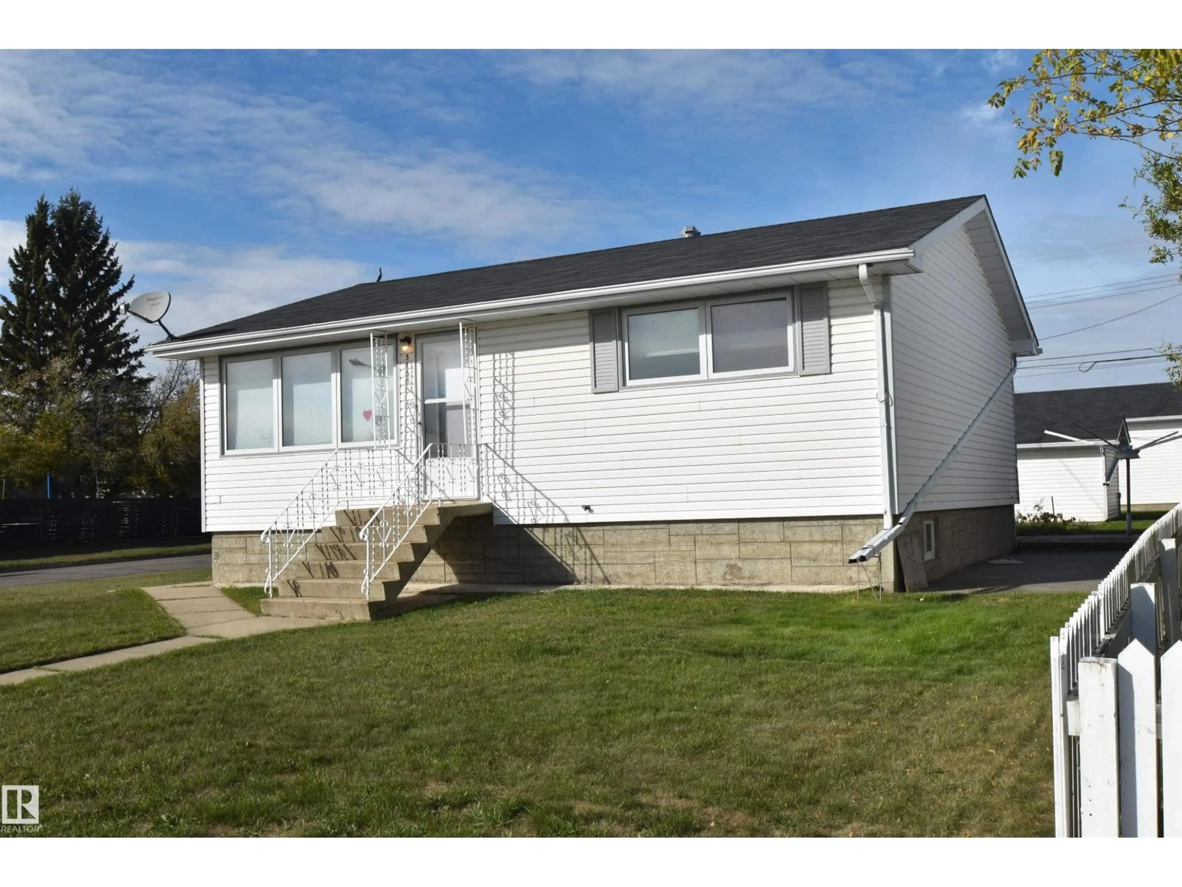 Home with vinyl exterior material, street for 5138 46 AV, St. Paul Town Alberta T0A3A2