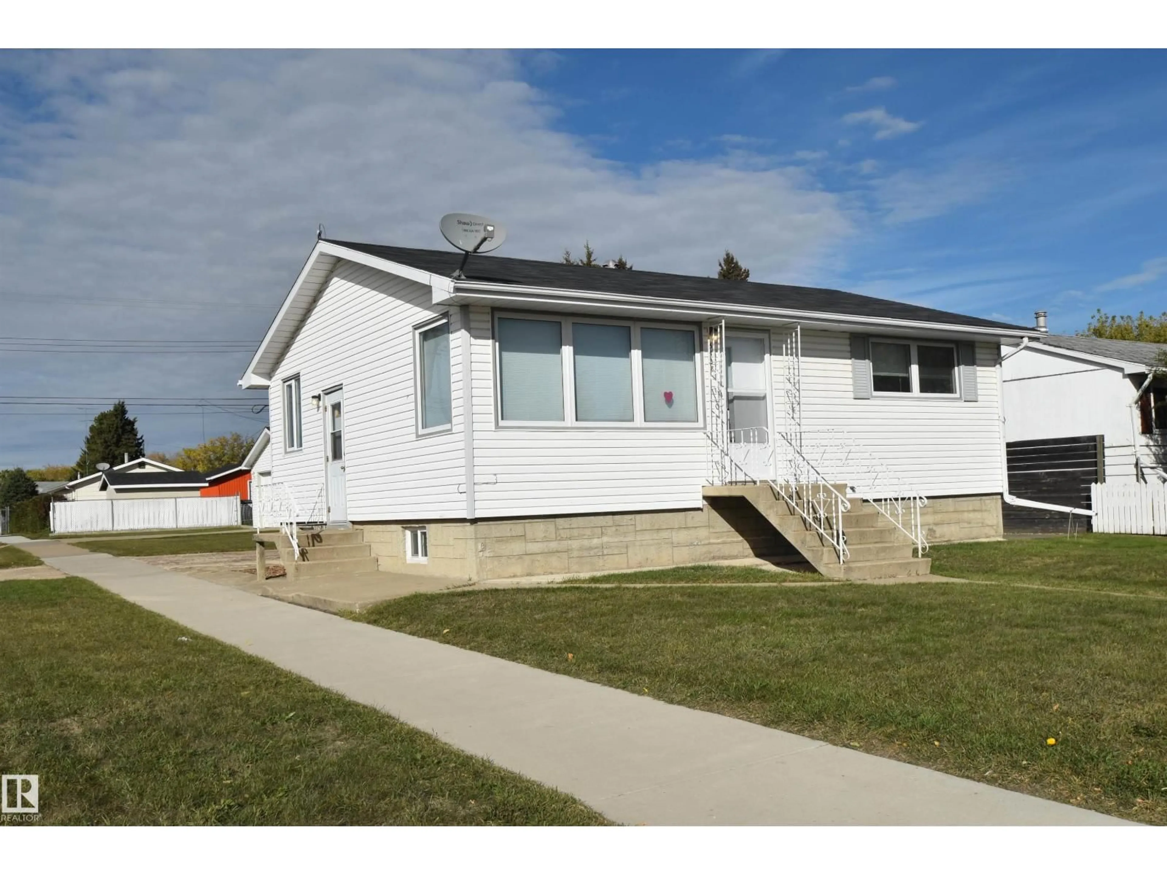 Home with vinyl exterior material, street for 5138 46 AV, St. Paul Town Alberta T0A3A2