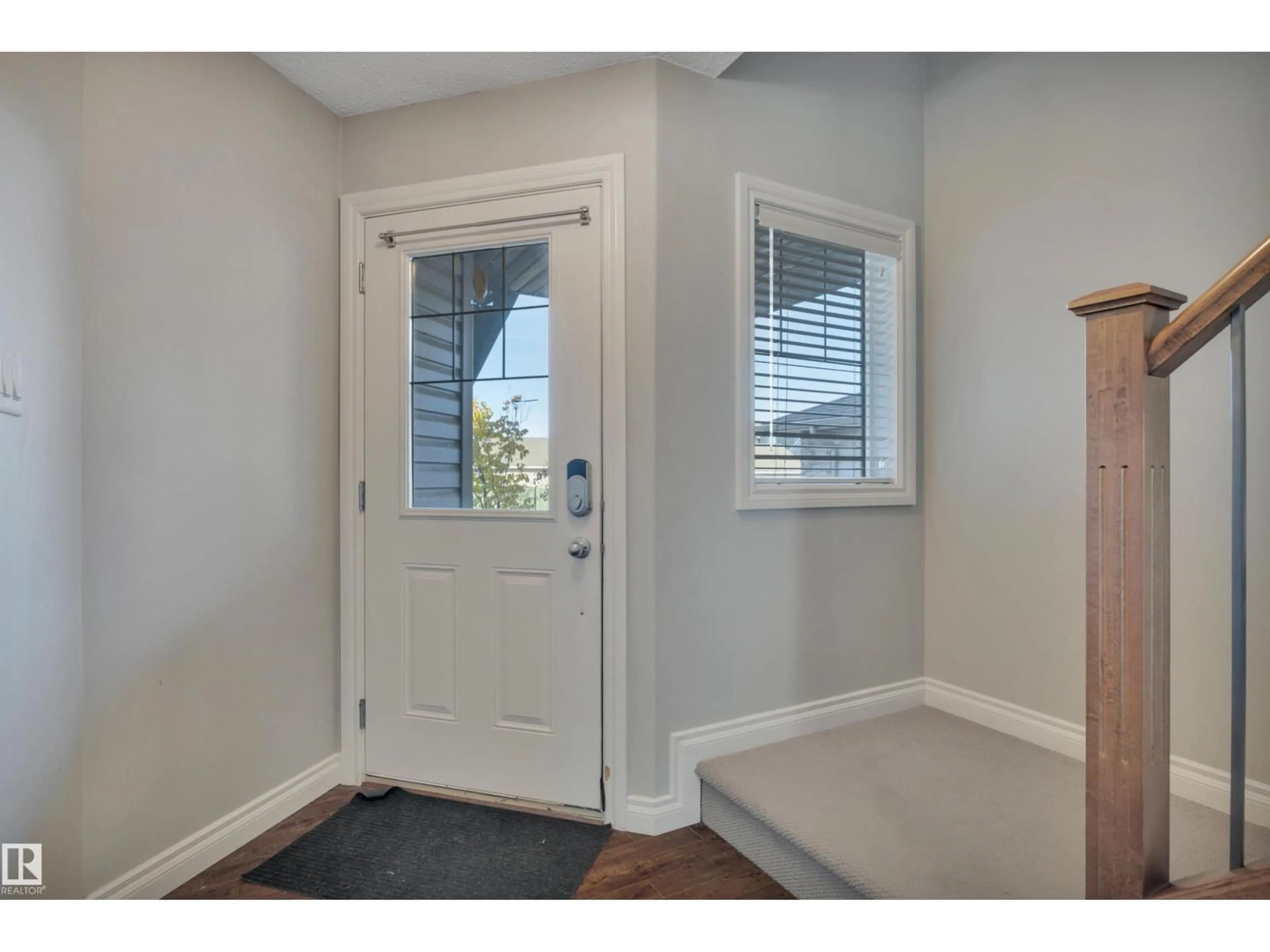 Indoor entryway for 21219 94 AV, Edmonton Alberta T5T4E6