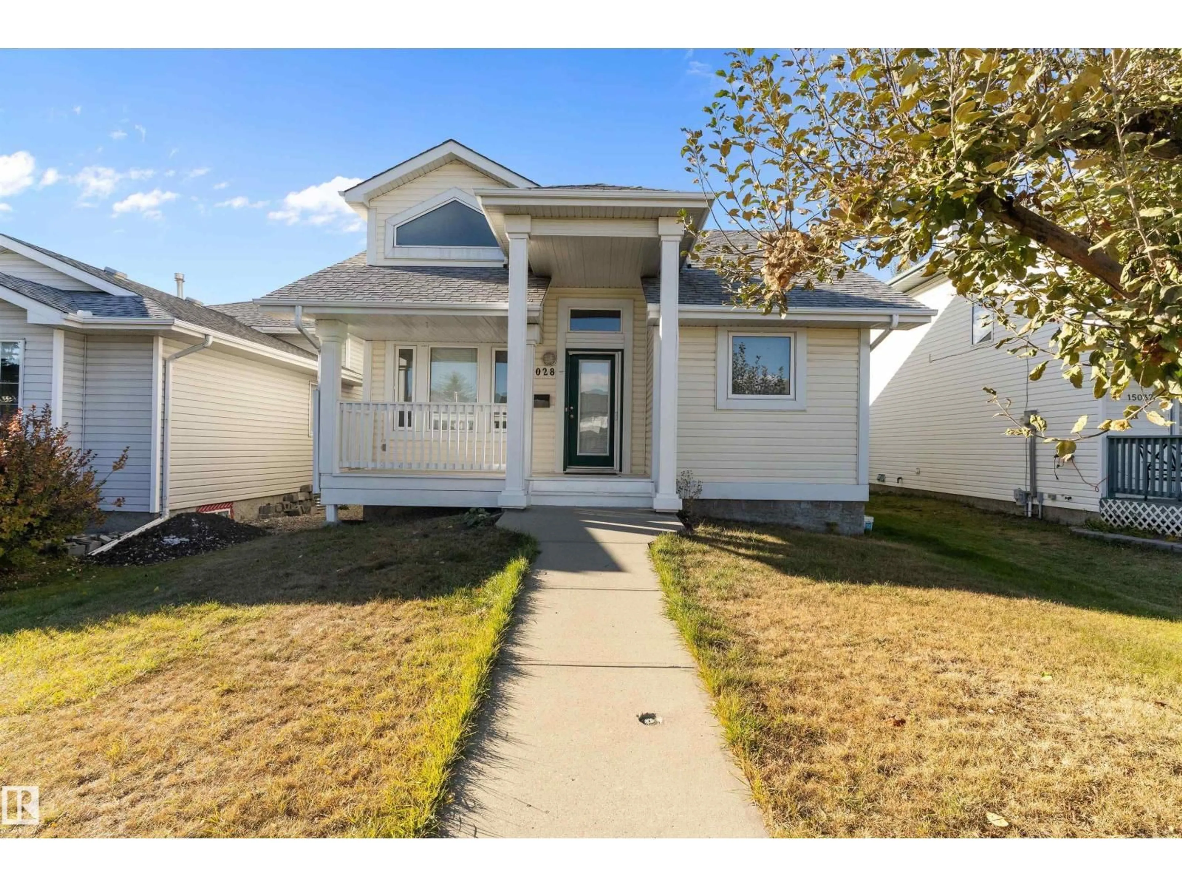 Home with vinyl exterior material, street for 15028 128 ST NW, Edmonton Alberta T6V1E9