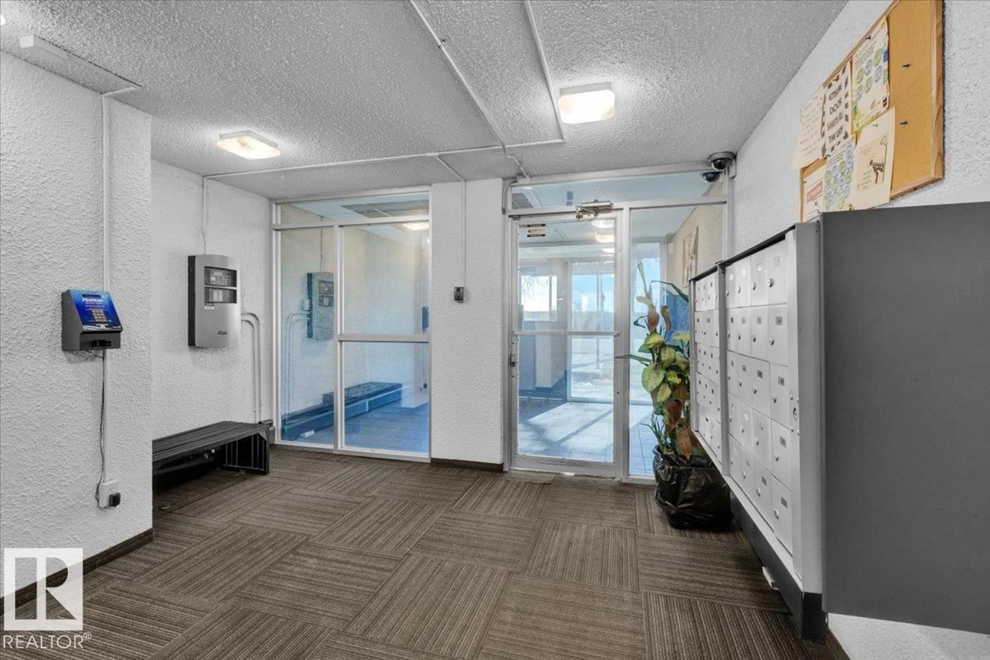 Indoor foyer for #204 - 8310 JASPER AV NW, Edmonton Alberta T5H3S3