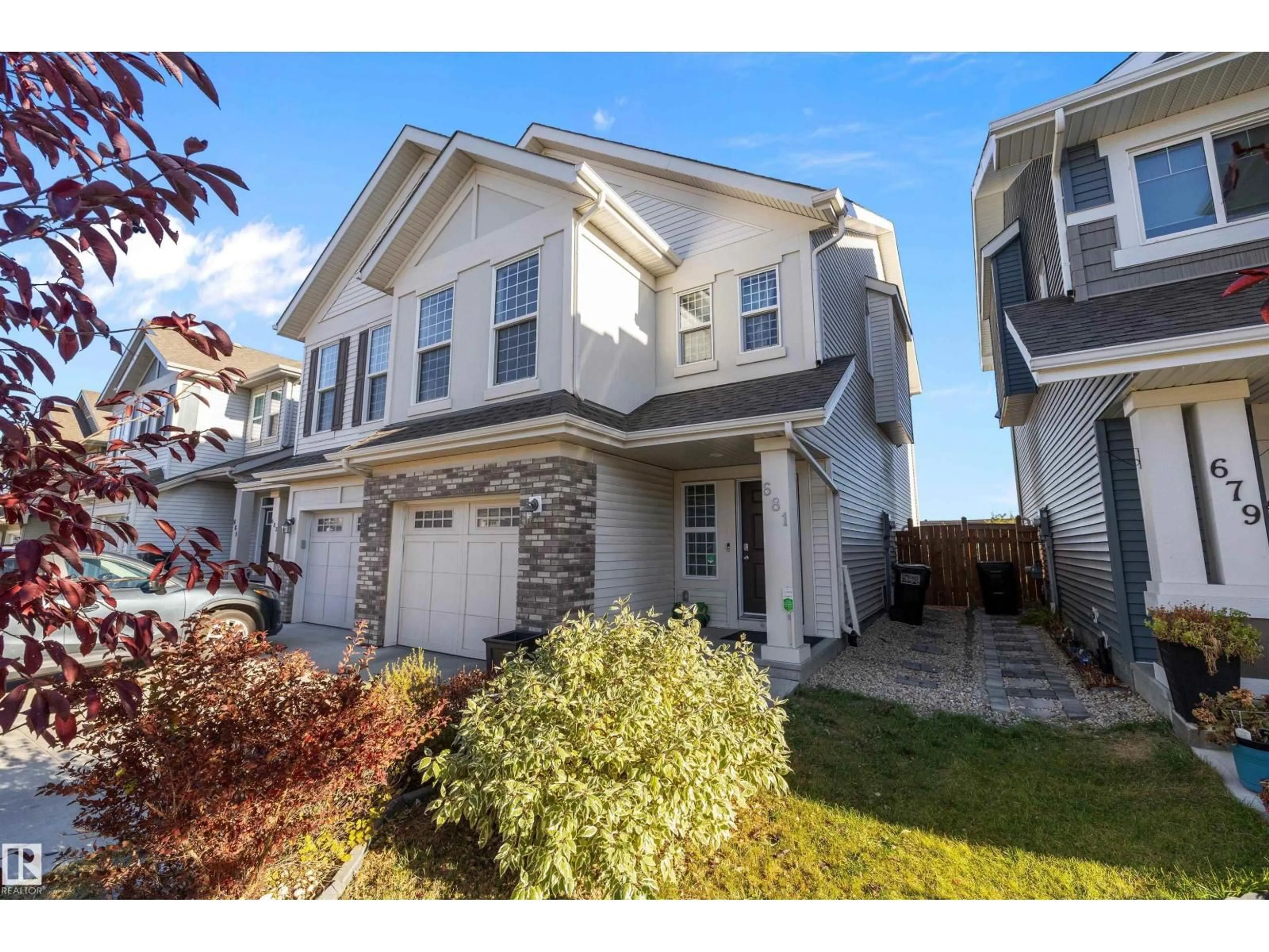 Home with vinyl exterior material, street for 681 EAGLEON CR, Edmonton Alberta T6M0V7