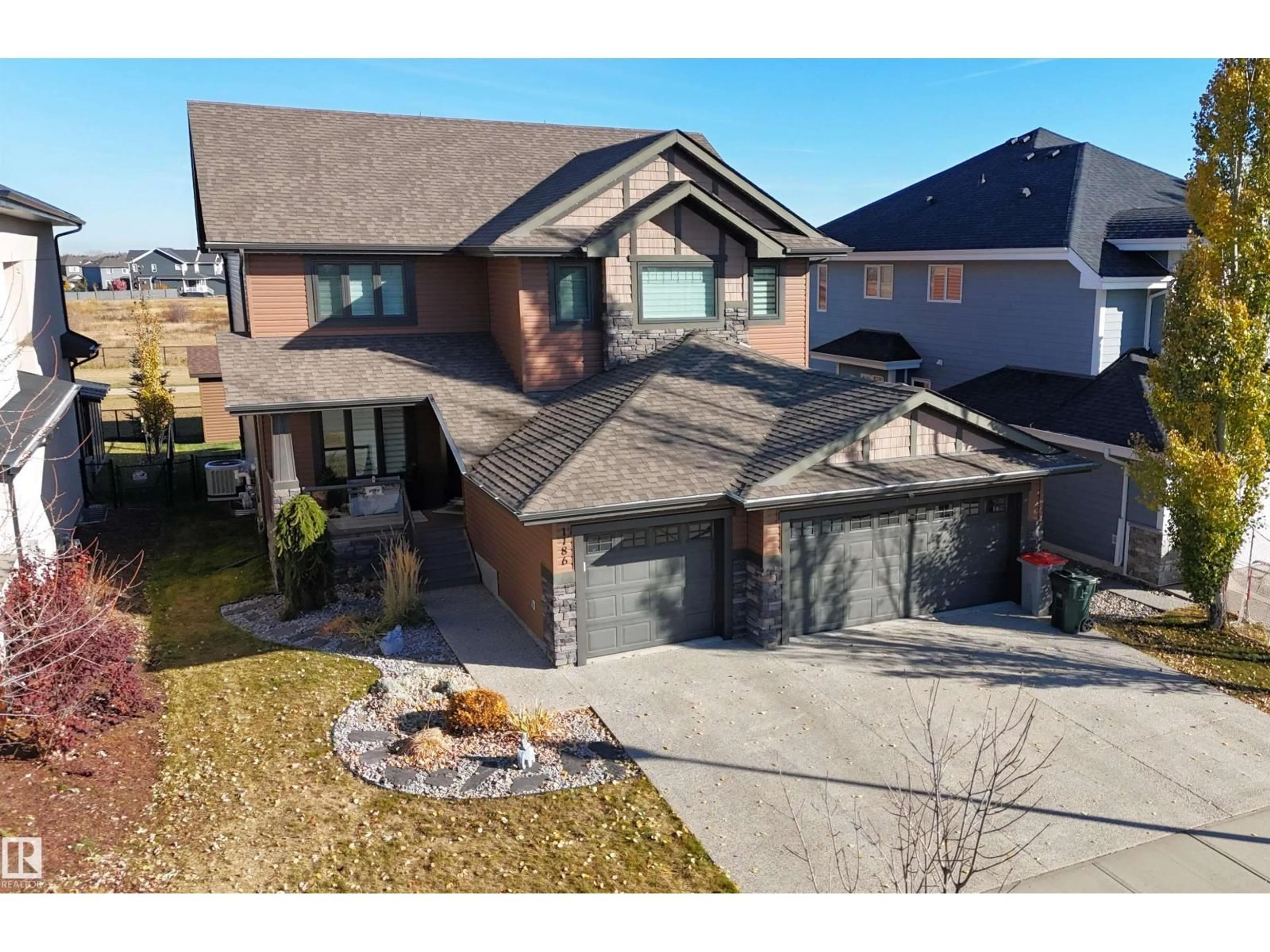 Home with brick exterior material, street for 1186 GENESIS LAKE BV, Stony Plain Alberta T7Z0K5