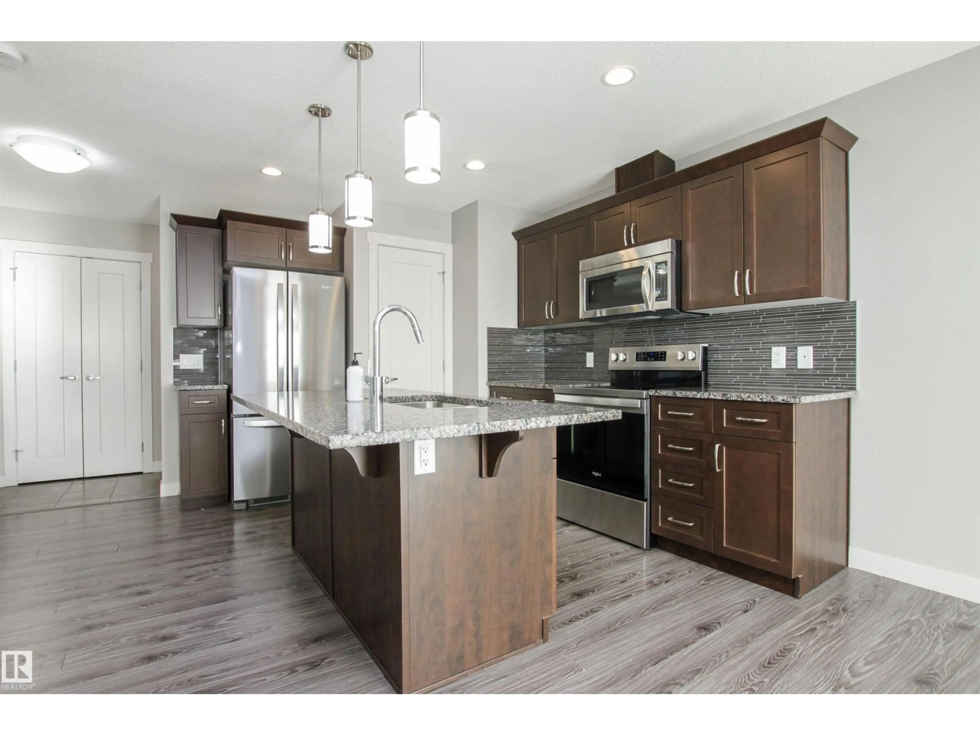 Open concept kitchen, unknown for 125 ABBEY RD, Sherwood Park Alberta T8H0Z2