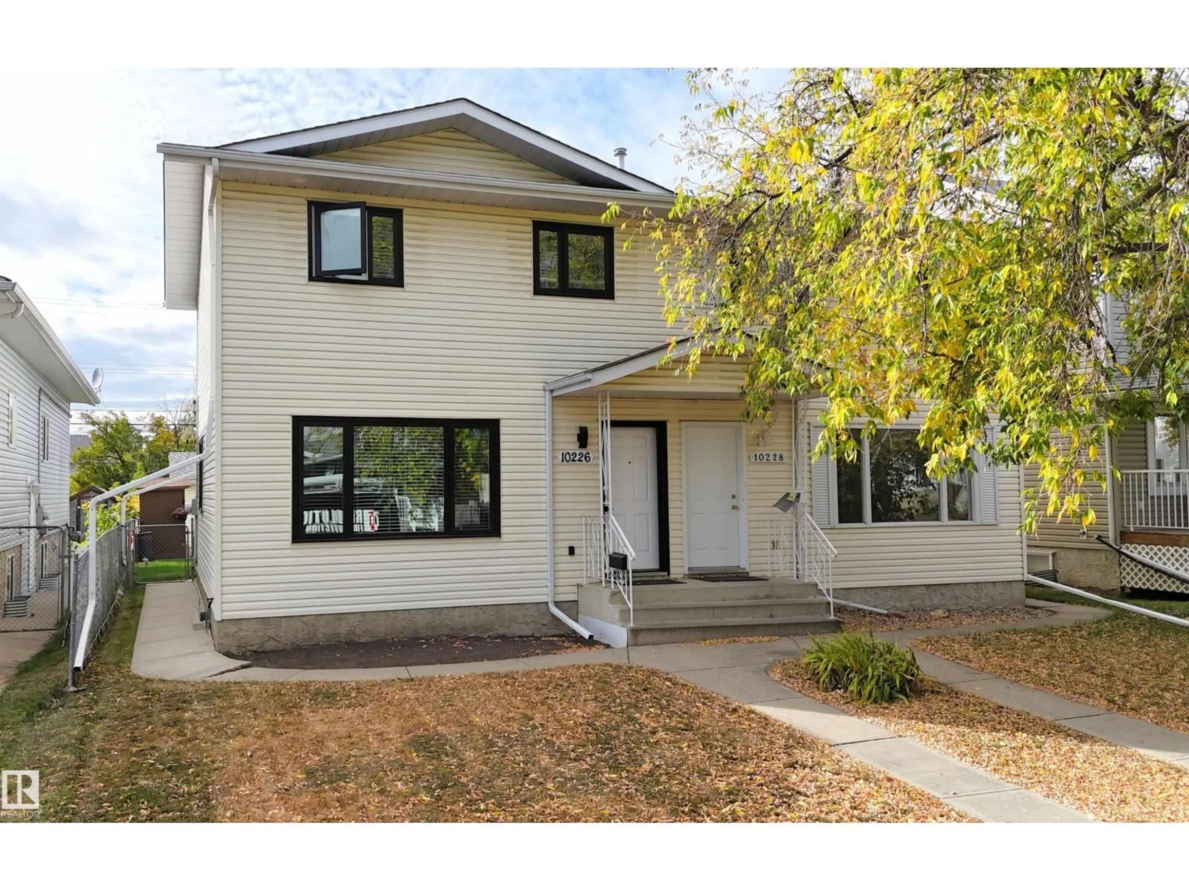 Home with vinyl exterior material, street for 10226 152 ST, Edmonton Alberta T5P1Y2