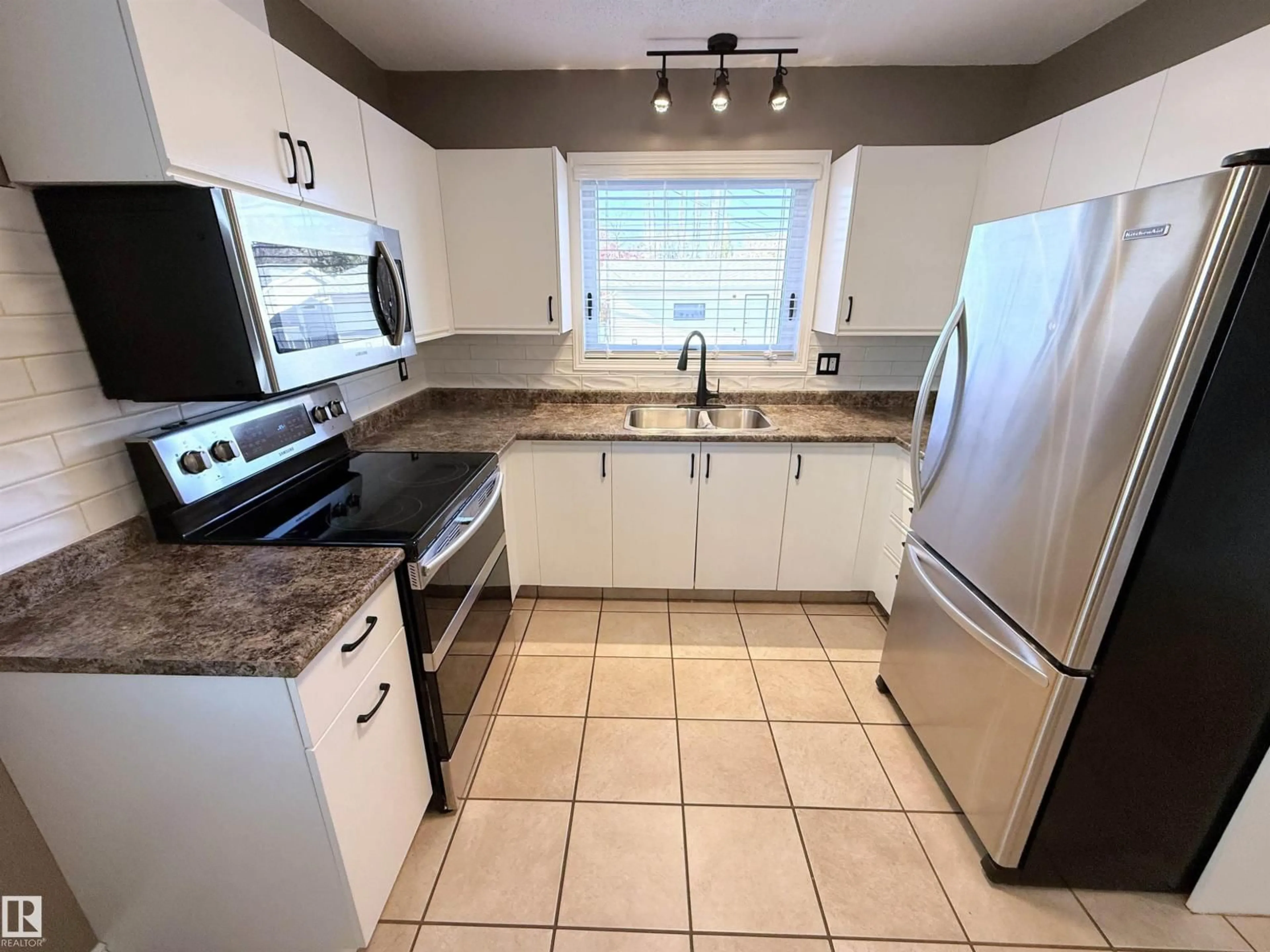 Standard kitchen, ceramic/tile floor for 10226 152 ST, Edmonton Alberta T5P1Y2