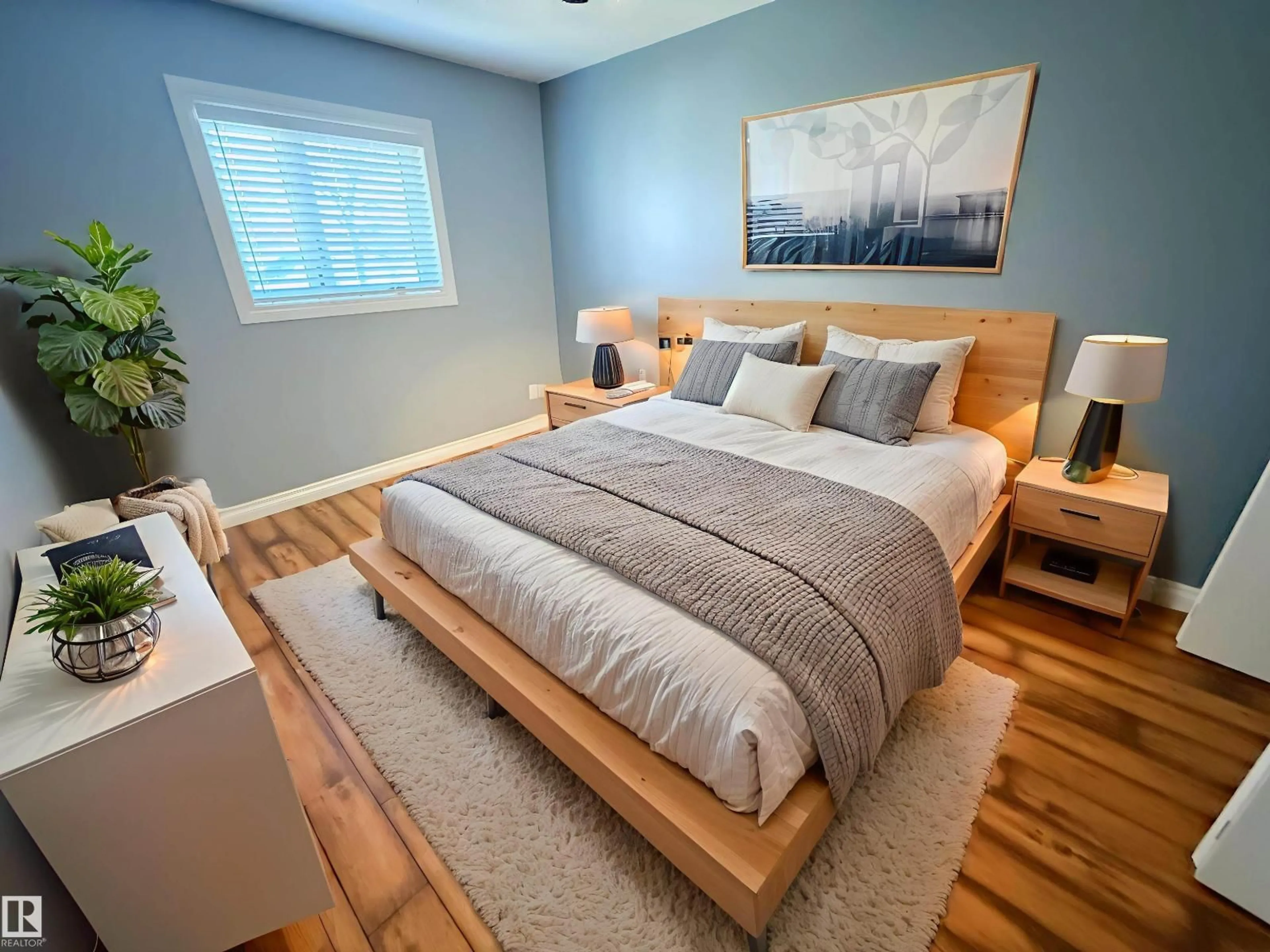 Bedroom with bed, wood/laminate floor for 10226 152 ST, Edmonton Alberta T5P1Y2