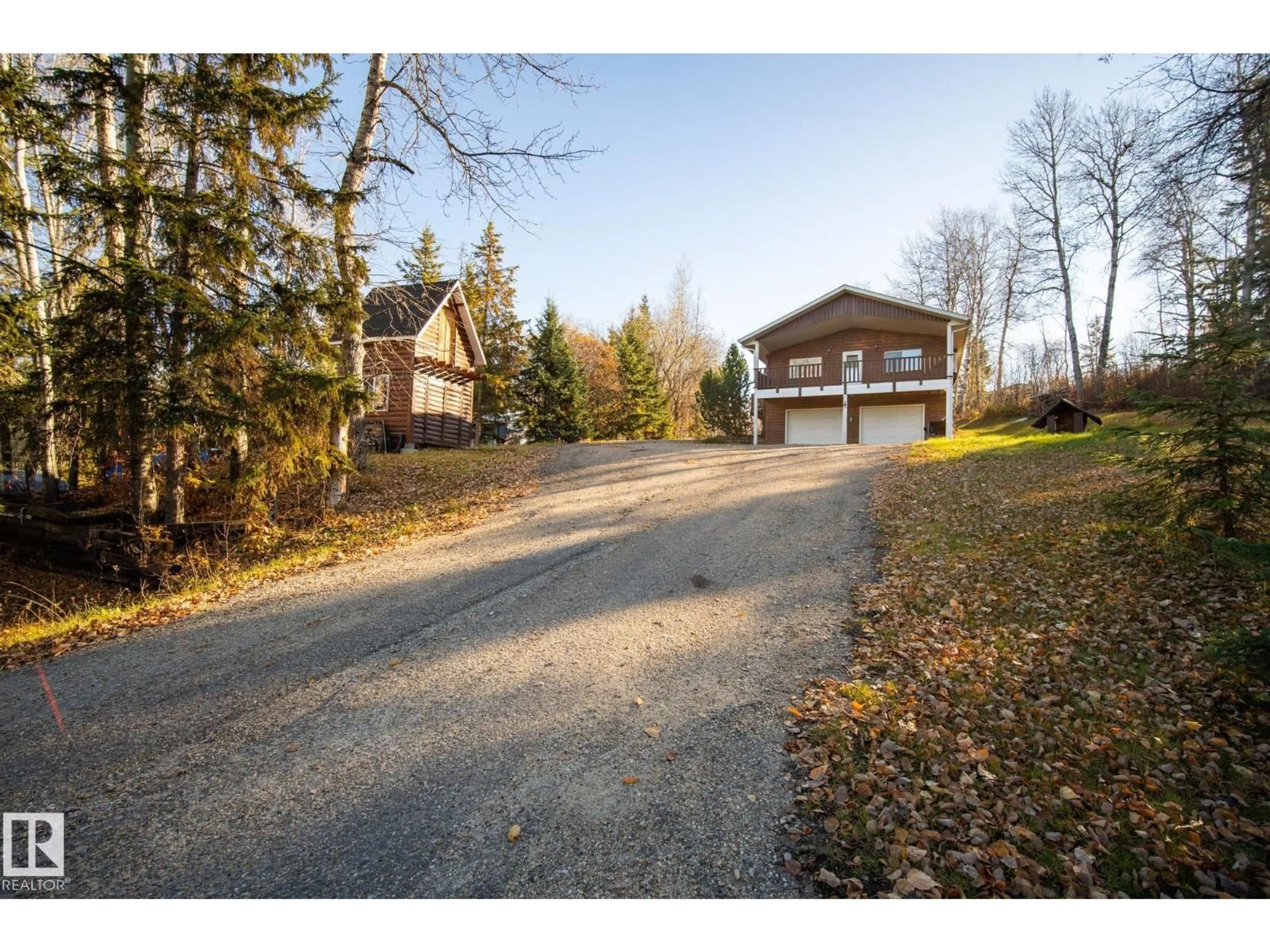 A pic from outside/outdoor area/front of a property/back of a property/a pic from drone, street for 6020 - 11 TWP 534, Rural Parkland County Alberta T0E0W0